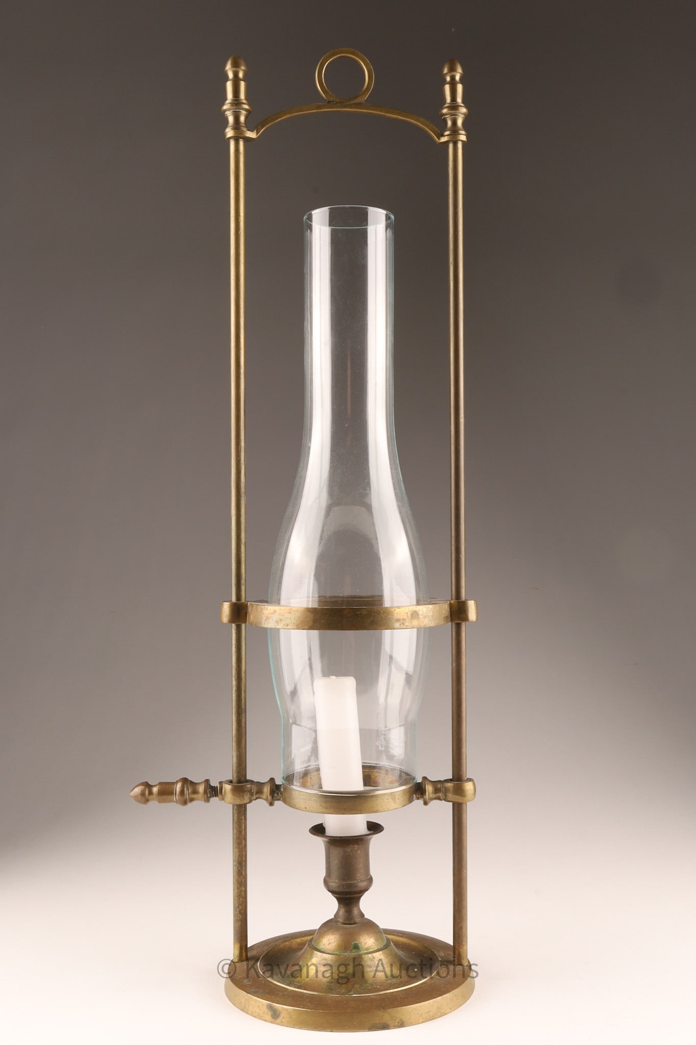 Portable Brass and Glass Adjustable Hurricane Candle Lamp: Portable Brass and Glass Adjustable Hurricane Candle Lamp Date / Period: 20th c. Medium: Brass Glass Color: Gold Dimensions: 19.5" h x