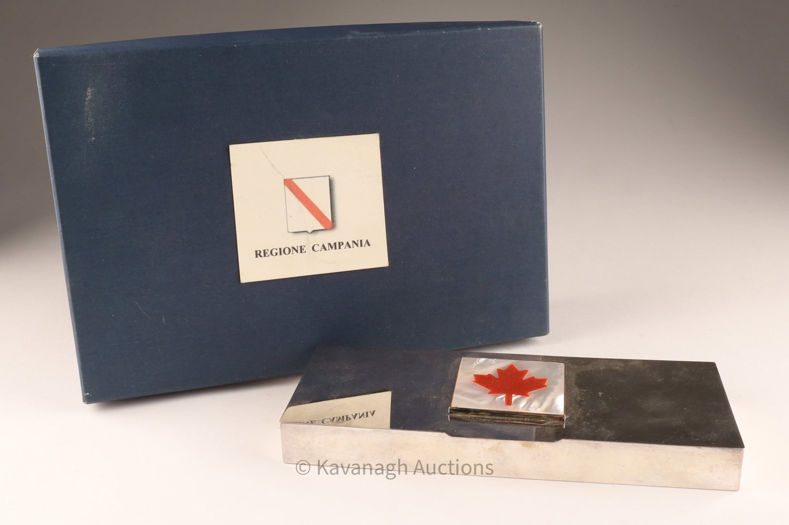 Italian Silver & Mother-of-Pearl Box, Enameled Canadian Maple Leaf: Italian .800 silver-mounted box with mother-of-pearl panels, centered with an enameled Canadian maple leaf motif. Marked with star “444 FL” (Florence workshop). Details Origin: Italy (Flore