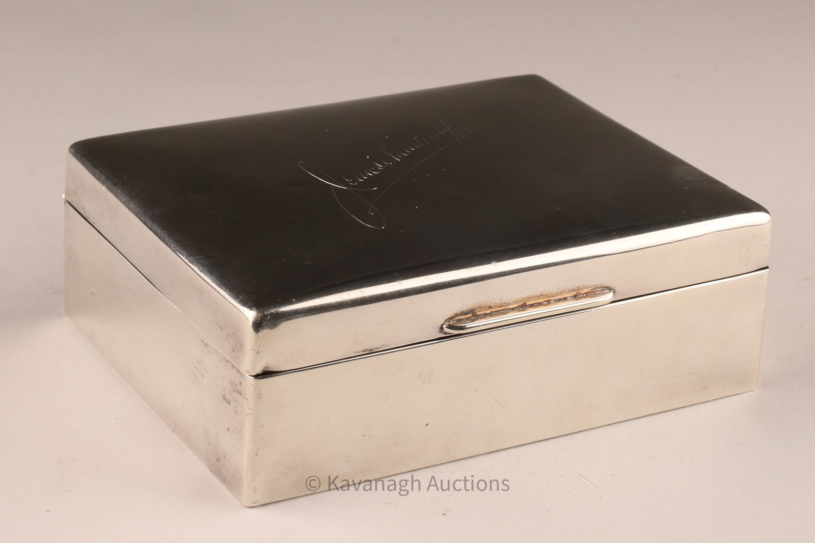 Birks Sterling Silver Cigarette Box, Wood-Lined, Engraved Initials, Hallmarked: Fine sterling silver cigarette box by Birks, of rectangular form with a gently domed lid engraved with personalized script initials. The exterior is finished in a clean, polished surface, characterist