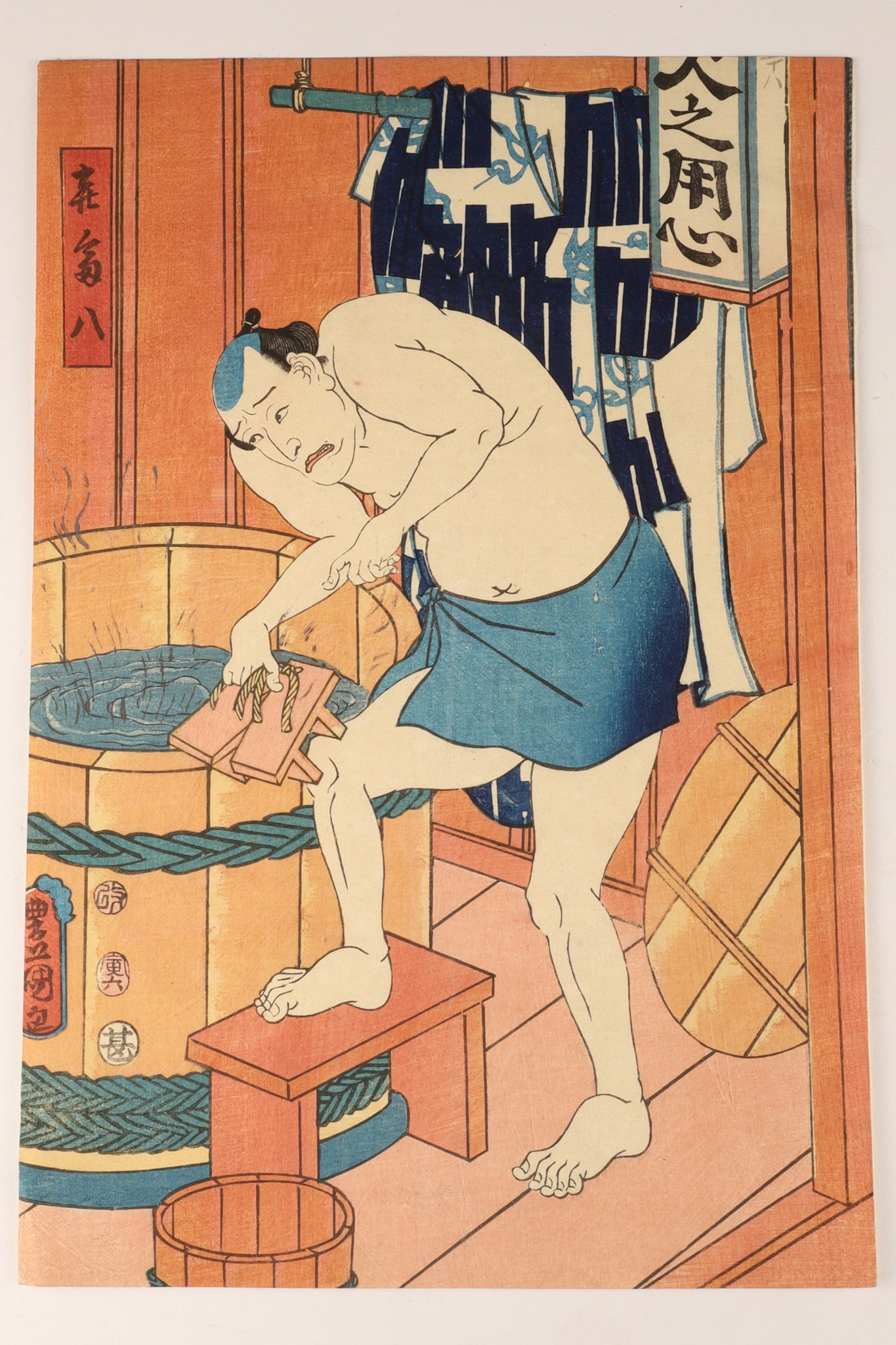 Utagawa Kunisada (1786-1864) Japanese Woodblock Print Man at a Bathtub: Japanese woodblock print, or ukiyo-e, created by the renowned artist Utagawa Kunisada (also known as Toyokuni III, 1786-1864) titled Man at a Bathtub (or Man vid badtunna) and is part of a series rela