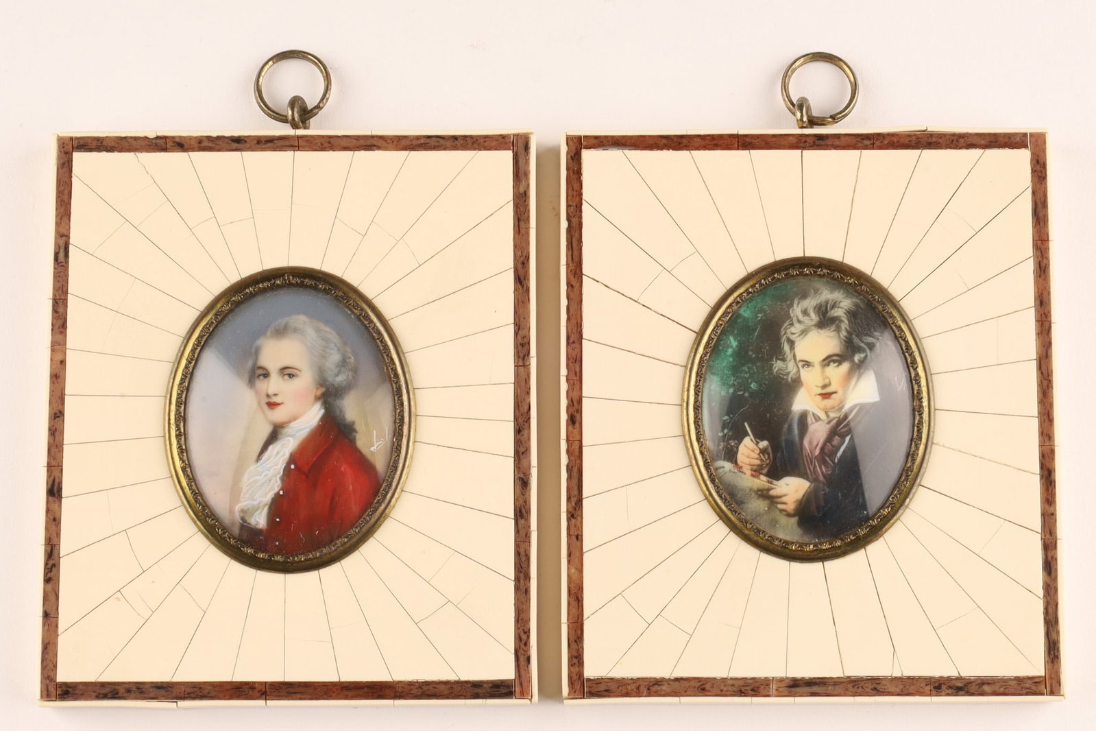 A Pair of Painted Miniature Portraits Mozart and Beethoven: A Pair of Painted Miniature Portraits Wolfgang Amadeus Mozart and Ludwig van Beethoven. Both signed over the sitters shoulders. Dimensions: 2 inches H, 4 H x 3.5 inches W.