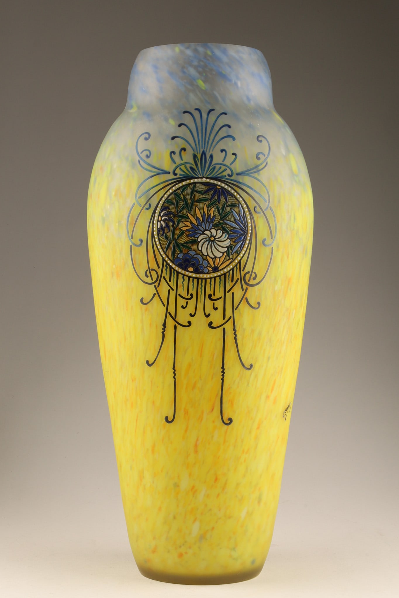 A Large Legras Cased and Enamelled Glass Vase C. 1920 Signed: An antique enamelled art glass vase made by Auguste Legras in Saint-Denis, France, around the turn of the 20th century. It features a bulbous form with a frosted, mottled yellow and blue glass body de