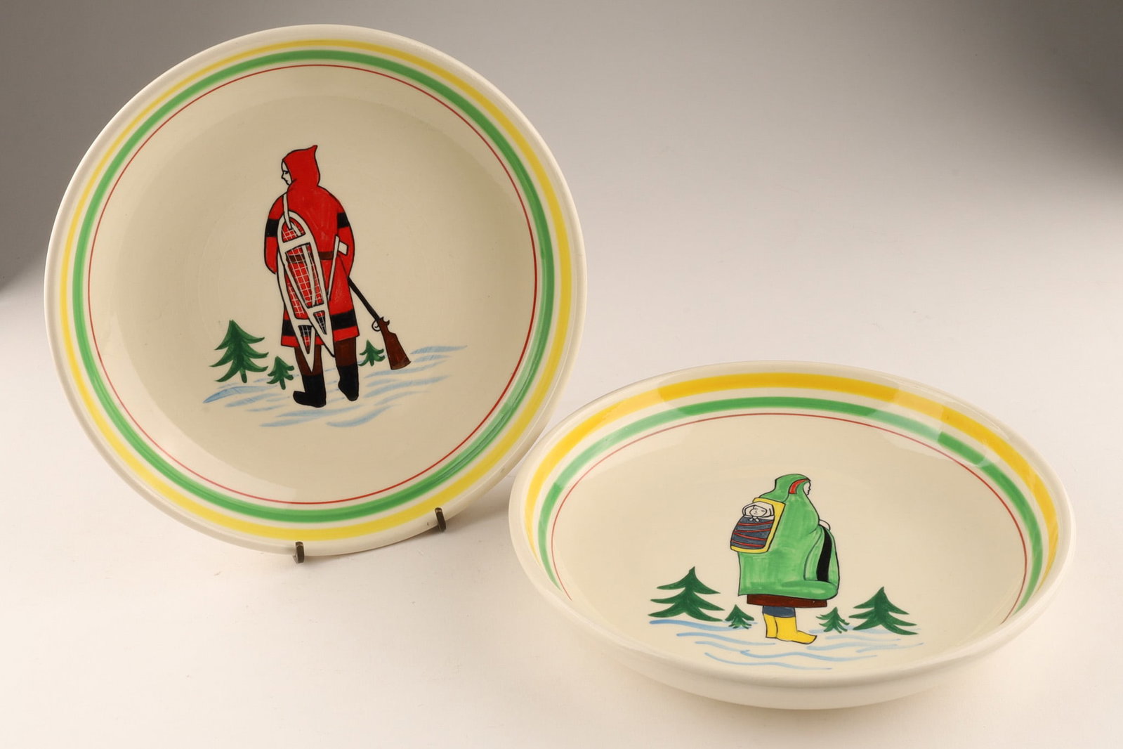 Pair of Canadiana Collection Bowls by Henriot Quimper for Ogilvy's of Montreal: Pair of vintage Canadiana collection ceramic bowls by Henriot Quimper for Ogilvy's of Montreal. A rare piece of "Canadiana Decor, " as it was a custom commission for Ogilvy's, a historic hig