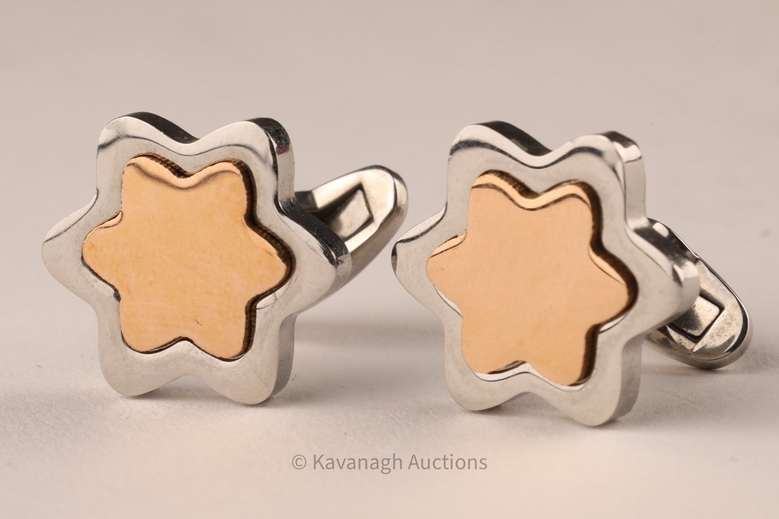 Montblanc Star Motif Cufflinks, Stainless Steel and gilt: Pair of Montblanc cufflinks featuring the brand’s iconic star motif, rendered in polished stainless steel with contrasting inlaid gilt centers. Details Brand: Montblanc Material: Stainless steel wit