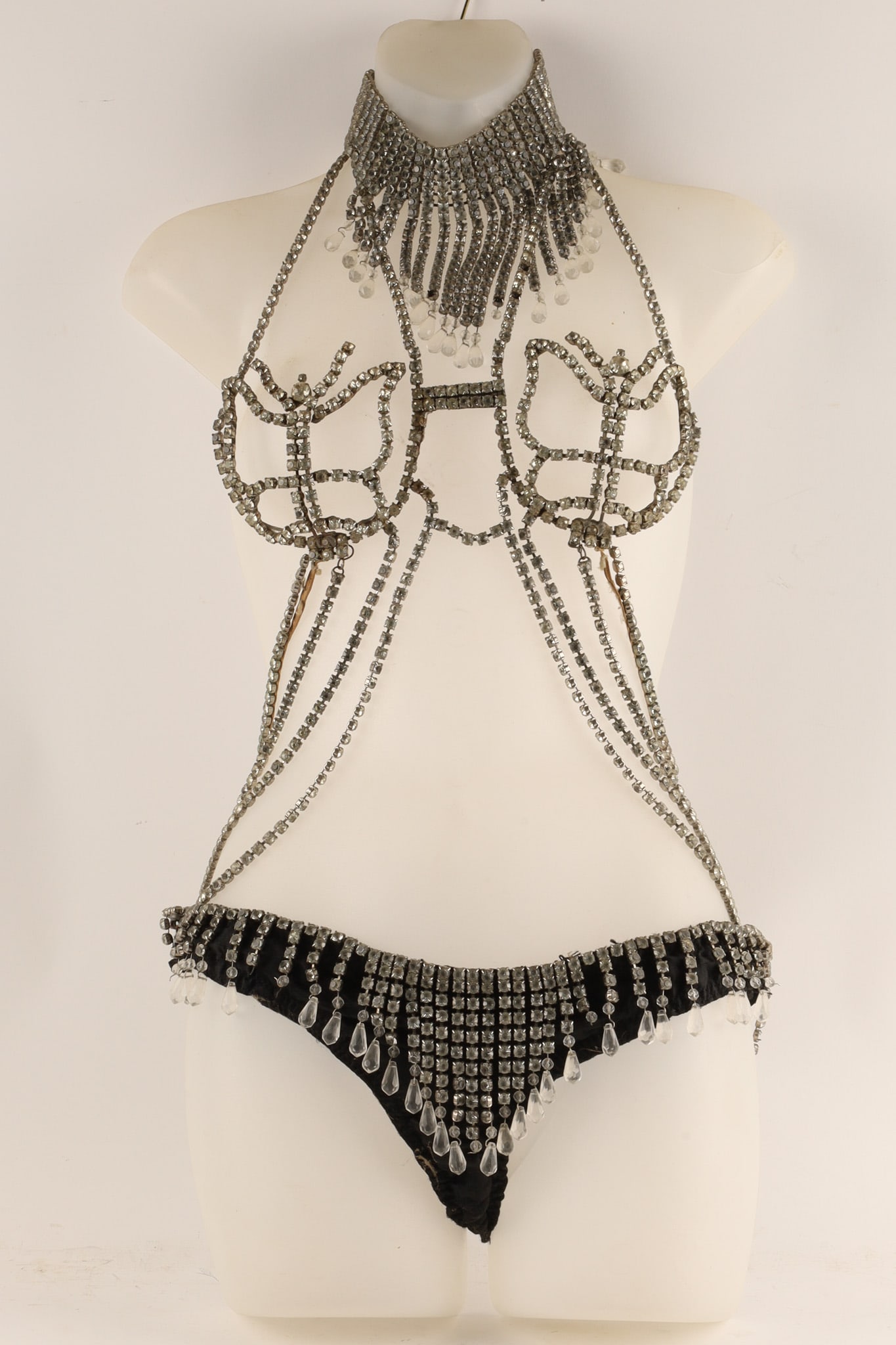 Art Deco Rhinestone Showgirl Folies Bergeres Stage Costume, Bustier and Bikini Bottom: A Stunning example of an Art Deco Rhinestone Showgirl Folies Bergeres Stage Costume and a piece of history. The Bodice: The top features an integrated choker-style collar made of multiple rows of rhin