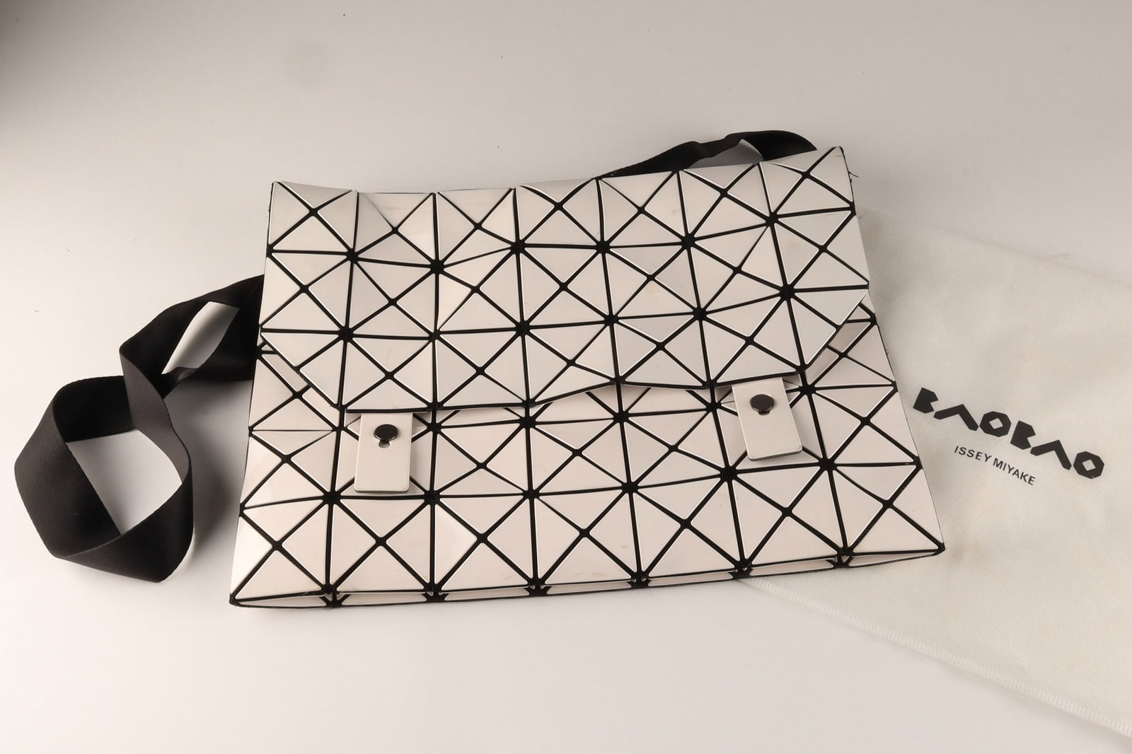A Bao Bao Issey Miyake Prism Shoulder Bag: A Bao Bao Issey Miyake Prism Shoulder Bag. This iconic bag is part of the BAO BAO ISSEY MIYAKE collection, known for its unique "shapes by chance" philosophy and geometric, futuristic design