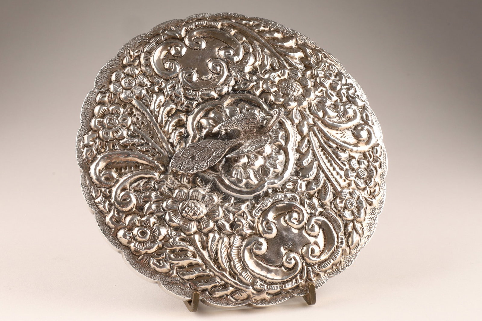 Egyptian .900 Sterling Silver Ottoman Style Wedding Mirror: Egyptian 900 Sterling Silver Ottoman Style Wedding Mirror with Silver hallmarks for Cairo. Decorated with repousse scrollwork and foliage, stylized peacock handle. Dimensions: 6 inches diameter 