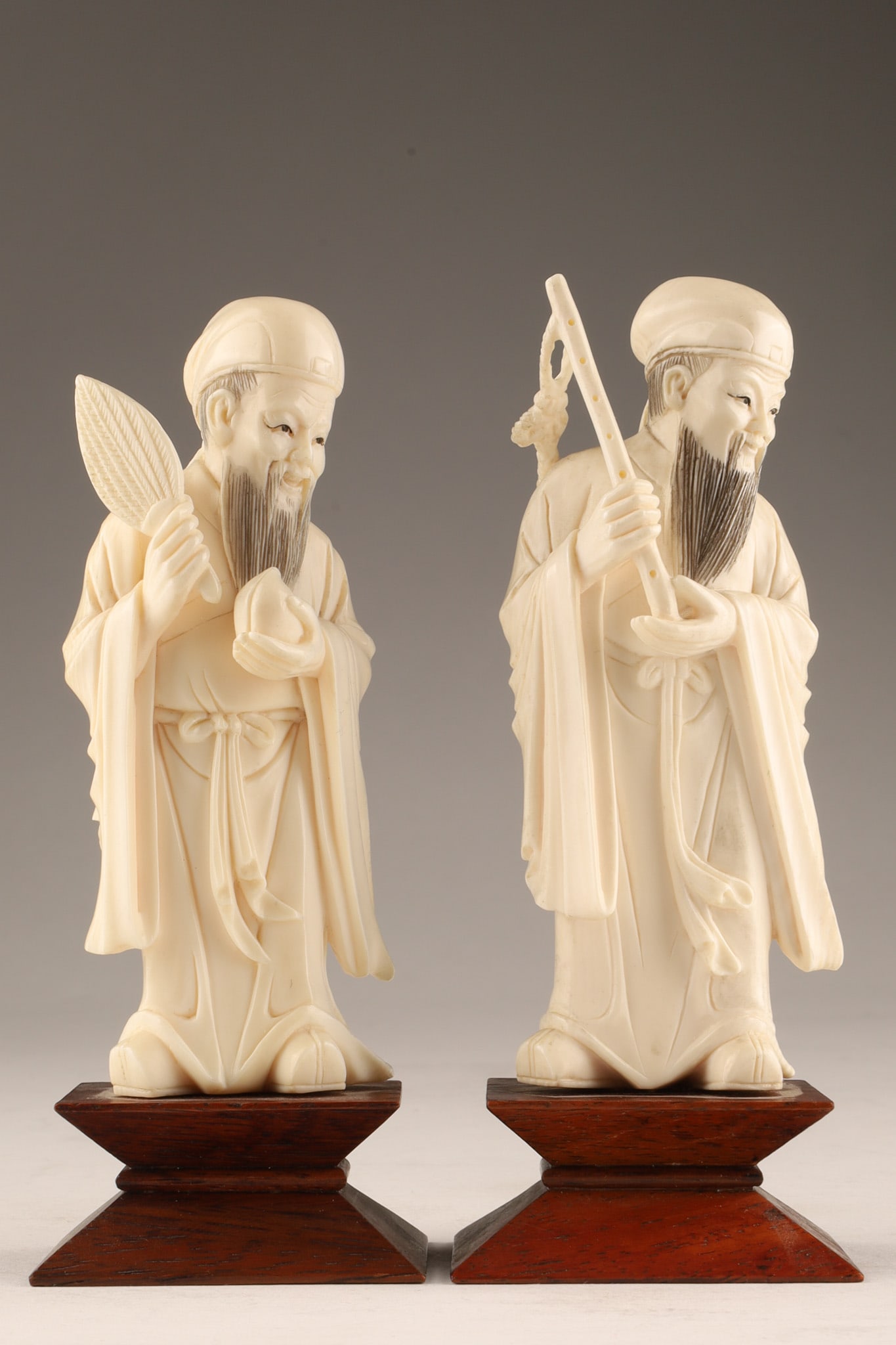 Pair of Chinese Carved Scholar Figures on Hardwood Bases (1 of 8)