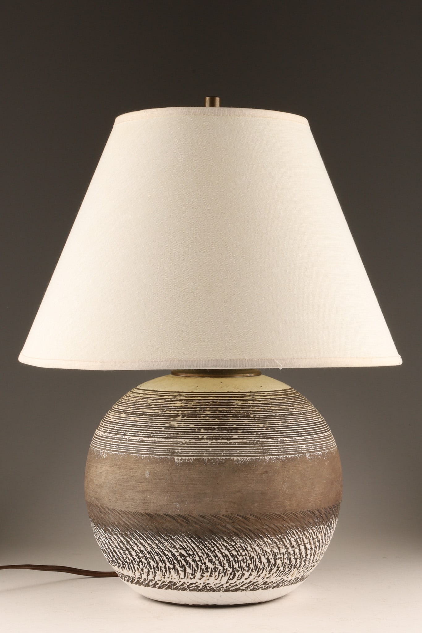 Art Deco Black and White Ceramic Ball Table Lamp by Keramos 1940, Jean Besnard Style: Art Deco style mid-20th-century Keramos ceramic ball or spherical table lamp base, often associated with French and European design. The base features a textured, banded pattern, in contrasting 