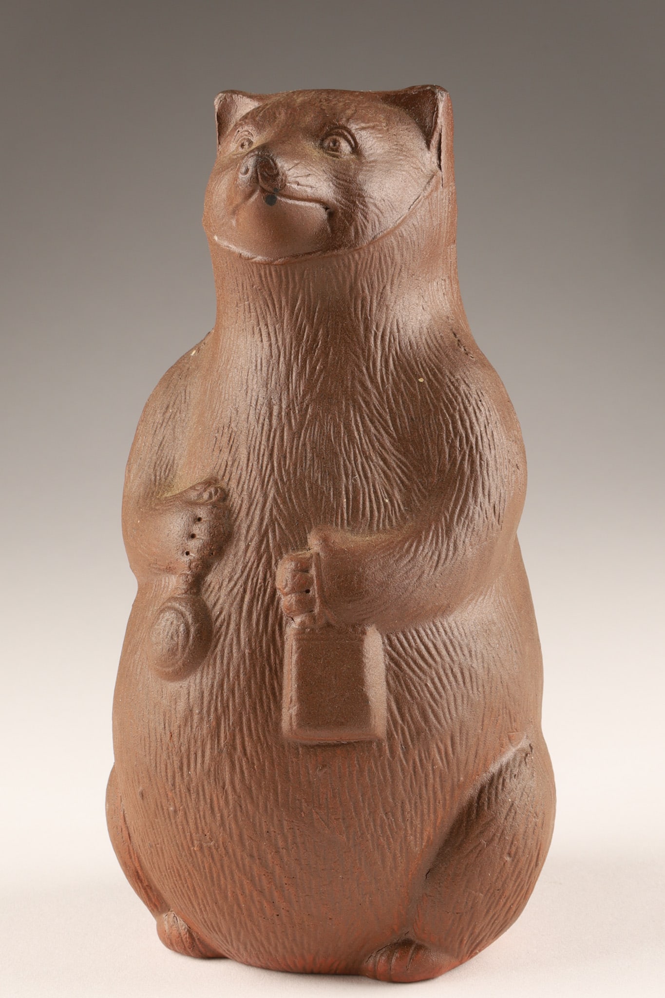Japanese Bizen Ware Pottery Sake Bottle in the form of a Tanuki (1 of 8)