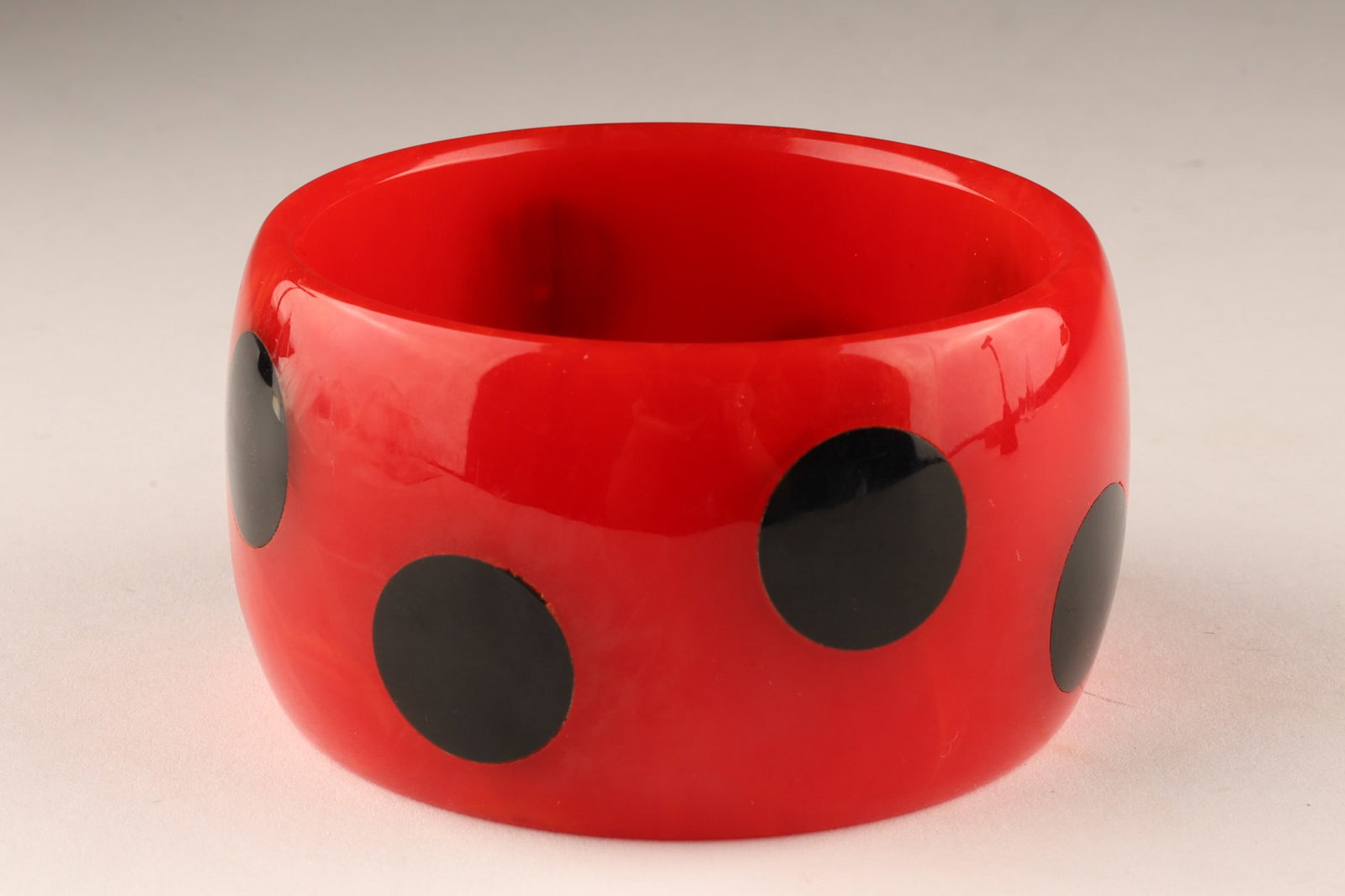 Cherry Red Bakelite Bangle Bracelet with Inlaid Black Polka Dots (1 of 6)
