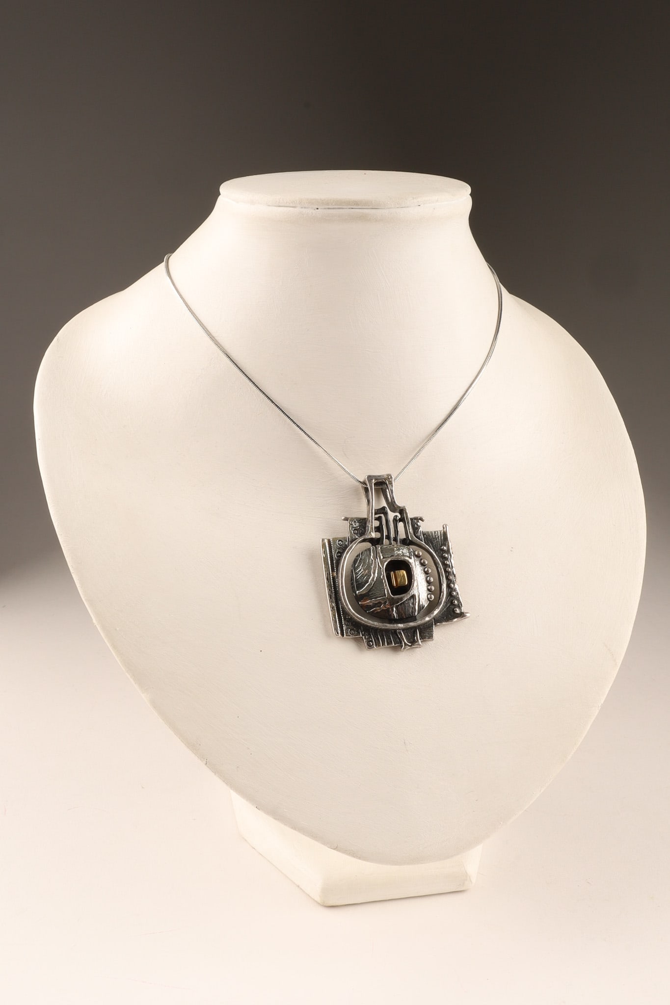 1970s Guy Vidal Modernist Brutalist Pewter Pendant Necklace: Authentic 1970s Canadian modernist pewter pendant featuring a heavily textured, architectural openwork design. The statement pendant measures 55mm x 40mm and hangs on a flexible snake chain, with a to