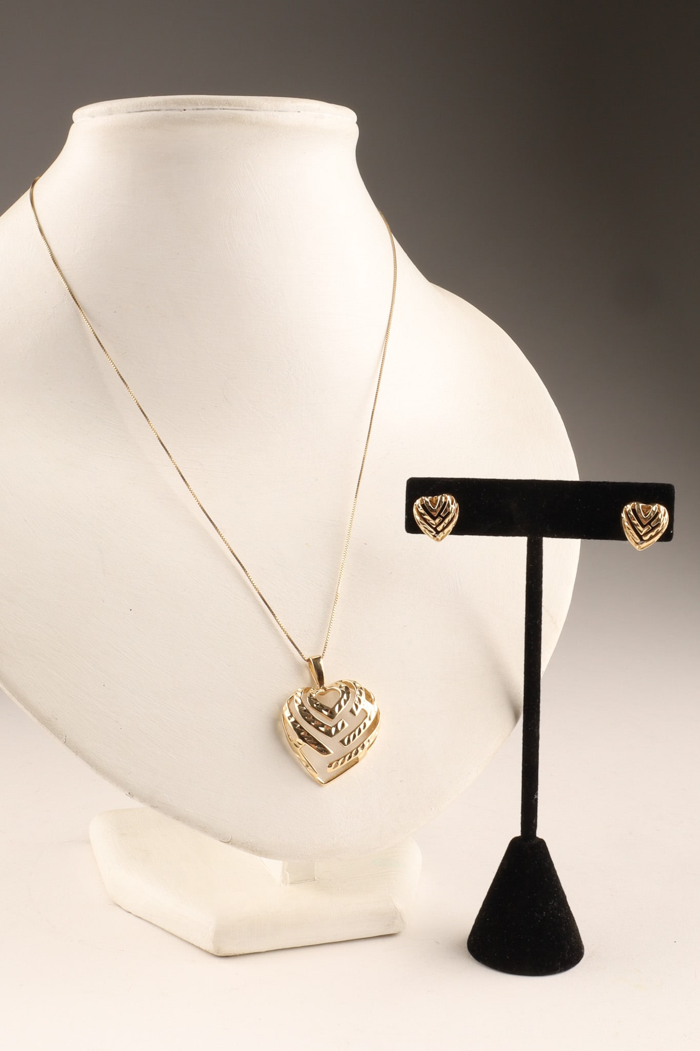 14K Gold Filigree Puffy Heart Pendant Necklace and Stud Earrings.: 14K Gold Filigree Heart jewelry collection, featuring a puffed heart pendant necklace and matching stud earrings. Total weight 9.7 grams, chain measures 18 inches L.