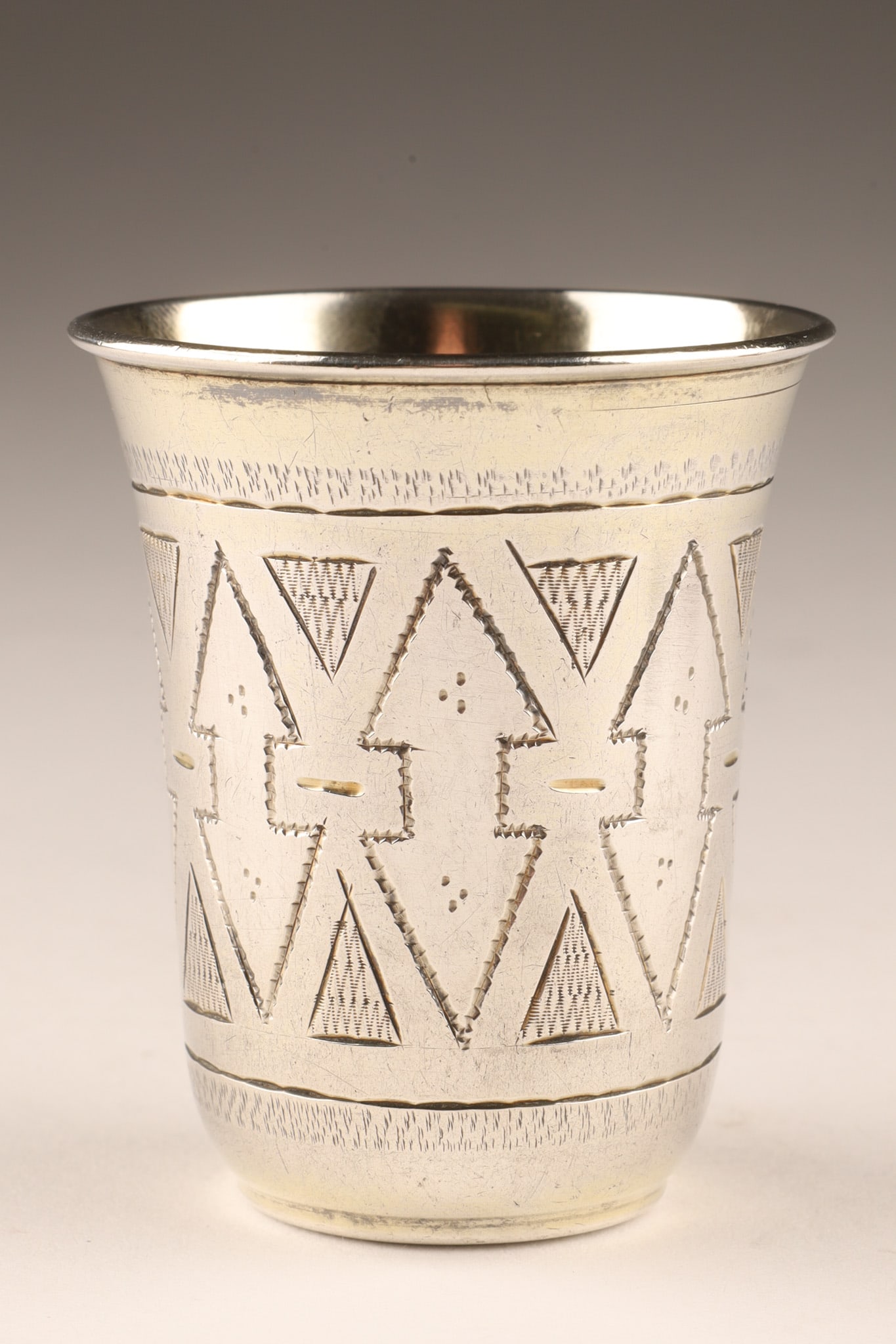 Antique Russian Sterling Silver Kiddush Cup Ivan Yefimovich Konstantinov, Moscow: Antique Russian Sterling Silver Kiddush Cup decorated with incised geometric design, assay mark of master Ivan Yefimovich Konstantinov, Moscow, 1877. 24.8 grams, 48 x 40mm