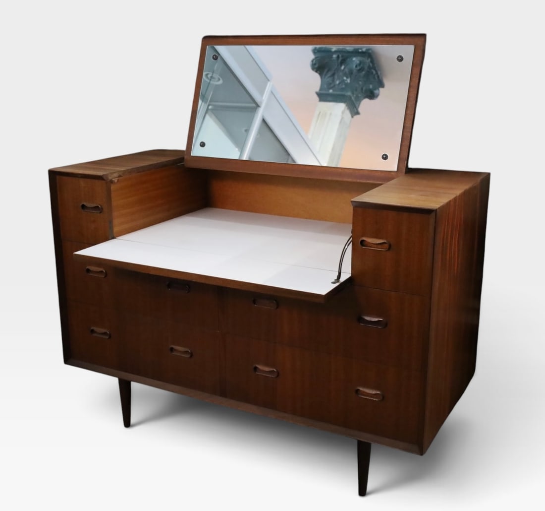 Mid Century Scandinavian Danish Teak Vanity Desk Dresser: Mid-century modern Scandinavian Danish teak vanity dresser with a fold-down desk surface and an integrated lift-up mirror with sculpted pulls and tapered legs. 32 H x 21 deep x 45 inches W.