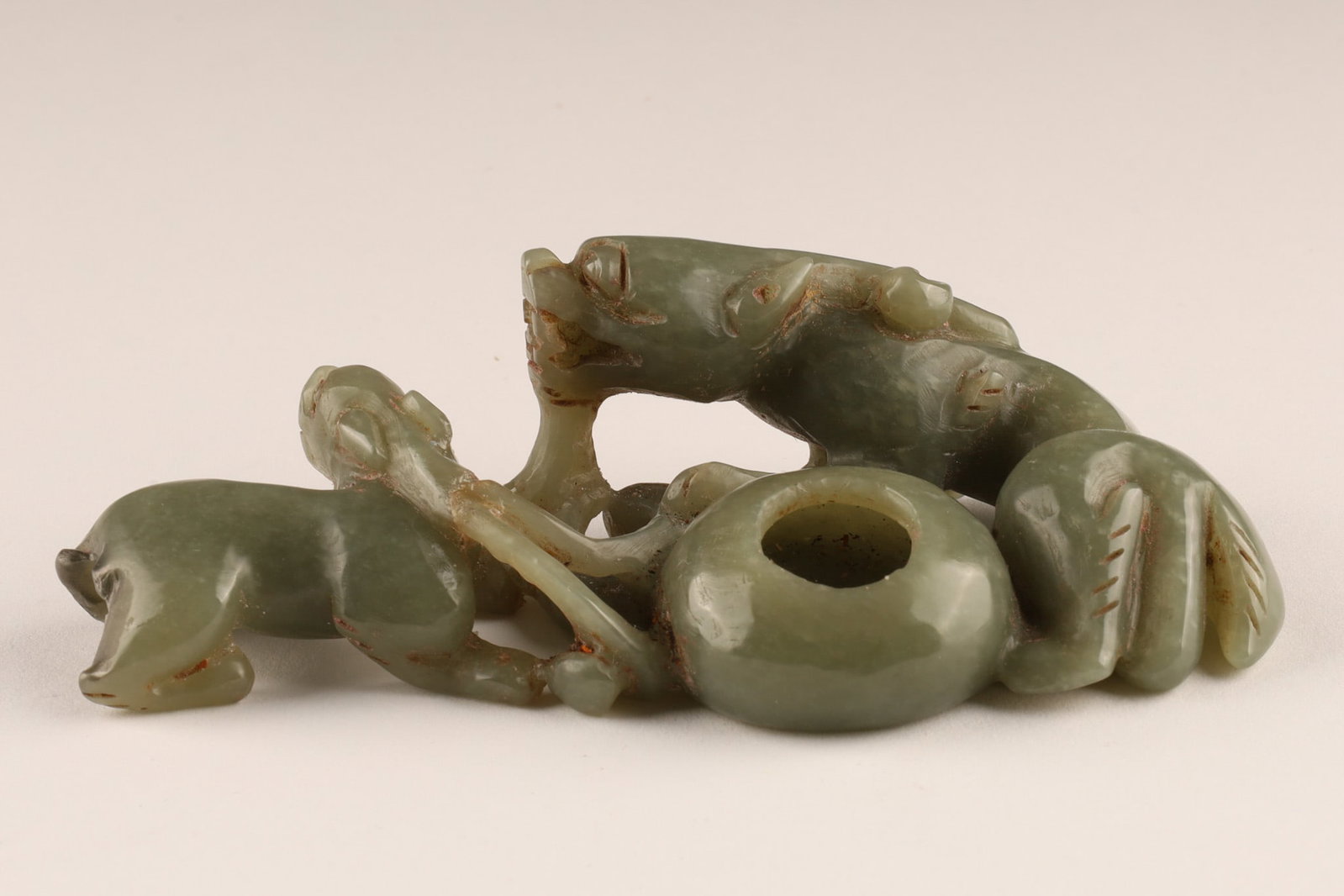 Chinese Green Jade Carved Mythical Beasts Brush Washer: Chinese Green Jade Carving depicting mythical beasts, two Chilong dragons surrounding a small bowl, brush washer. 5 inches L x 2.25 W x 1.5 H.