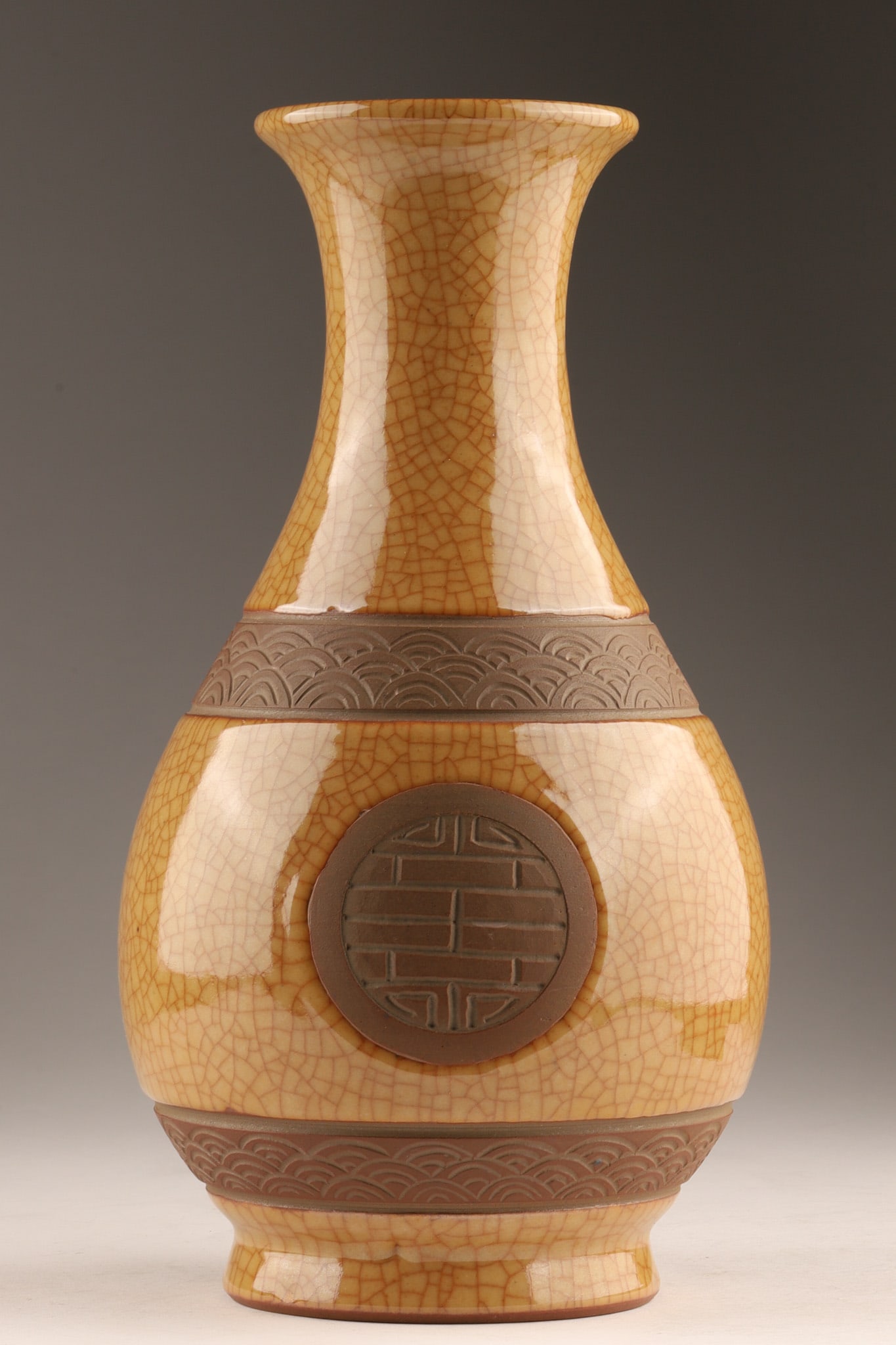 Signed Chinese Stoneware Crackle Ge Ware Vase: Signed Chinese Stoneware Crackle Ge Ware Vase featuring a glossy, crackled amber-tan glaze paired with unglazed or dark brown matte textured horizontal bands and inscribed character. Marked on u