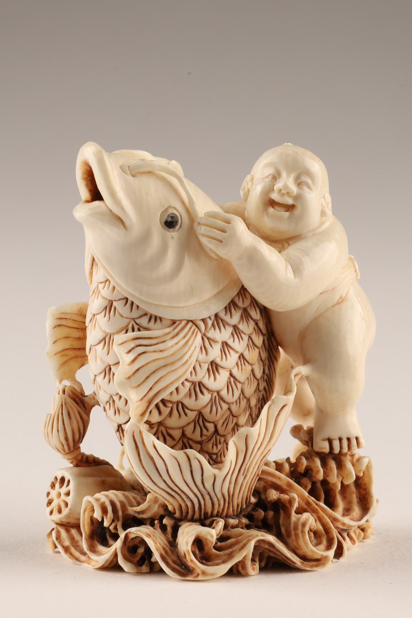 Signed Japanese Carved Netsuke Boy with Carp (1 of 9)