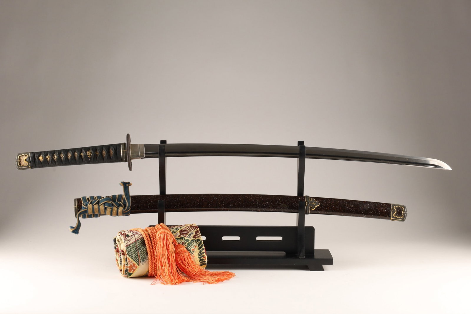 Japanese Muromachi Period Samurai Katana Sukesada: Very beautiful same design Shakudo Nanako koshirae signed Osafune Sukesada Muromachi period katana. The katana was made in the Tenbun era (july 1532 to October 1555) during the turbulent Sengoku perio
