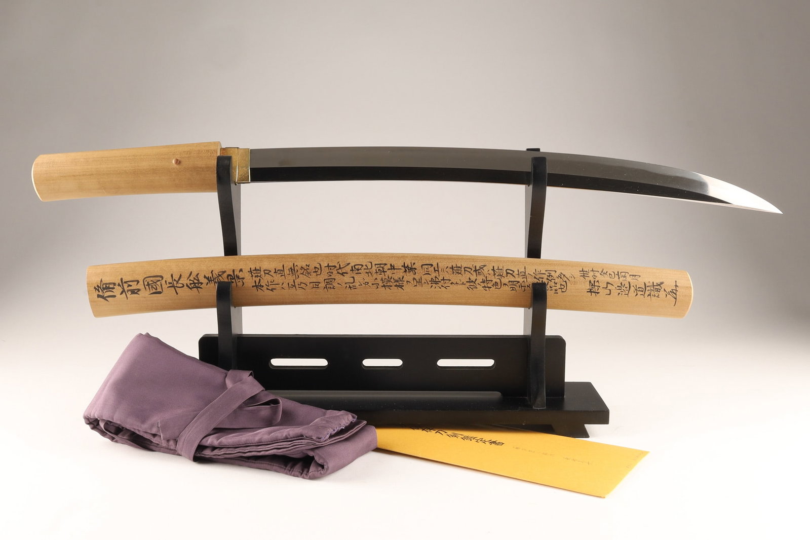 Bizen Osafune Kamakura Yoshikage Naginata Blade In Shirasaya: The son of the great swordsmith Kagemitsu, Yoshikage was one of the famous swordsmiths of the 14th century. He specialized in naginatas, powerful swords like this one. The shirasaya, which authenticat
