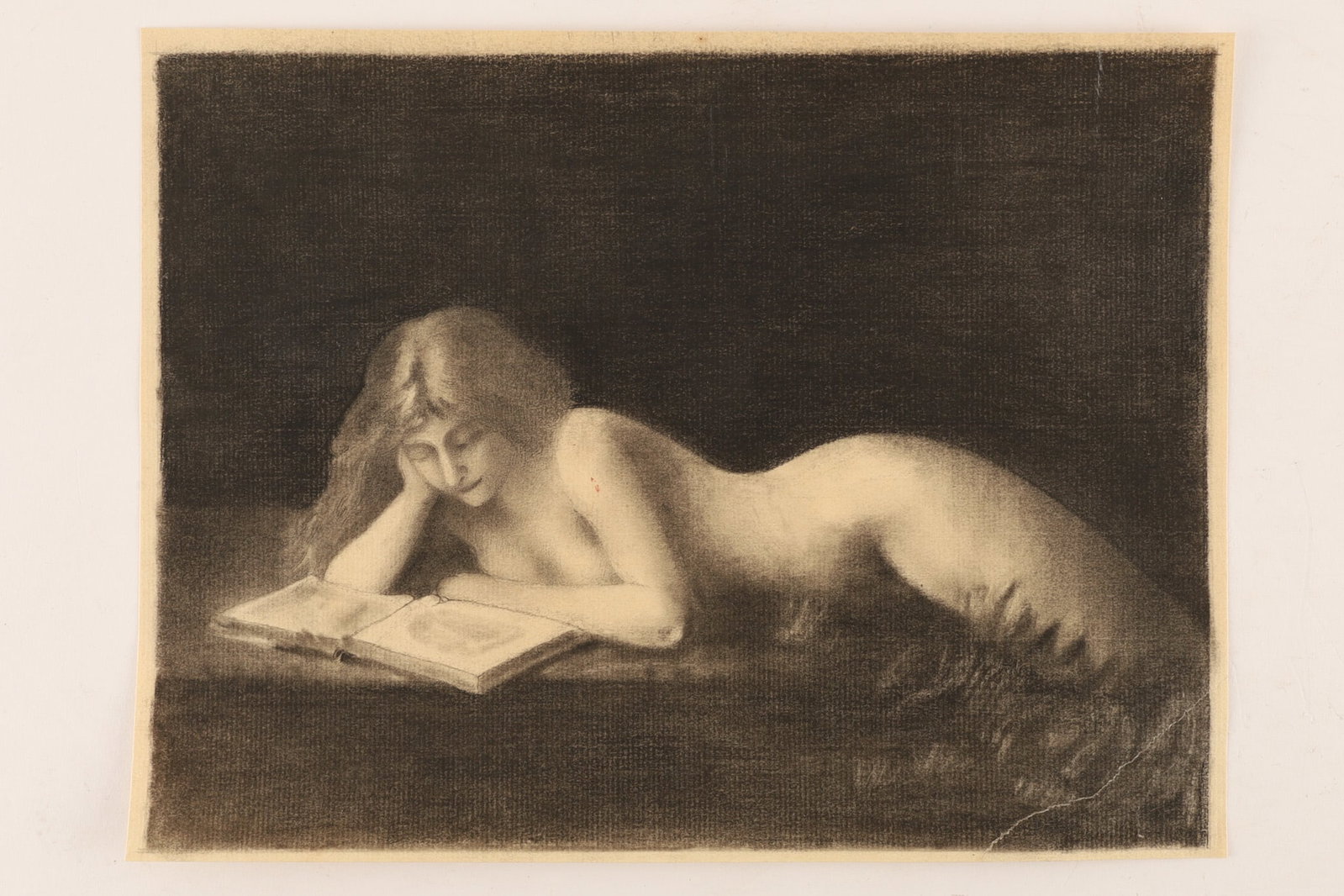 Jean-Jacques Henner, After, Reclining Female Nude Reading, Circa 1900: After Jean-Jacques Henner (French, 1829-1905) Reclining Female Nude Reading Charcoal and black chalk on paper depicting a reclining female nude absorbed in reading, rendered with the soft modelling an