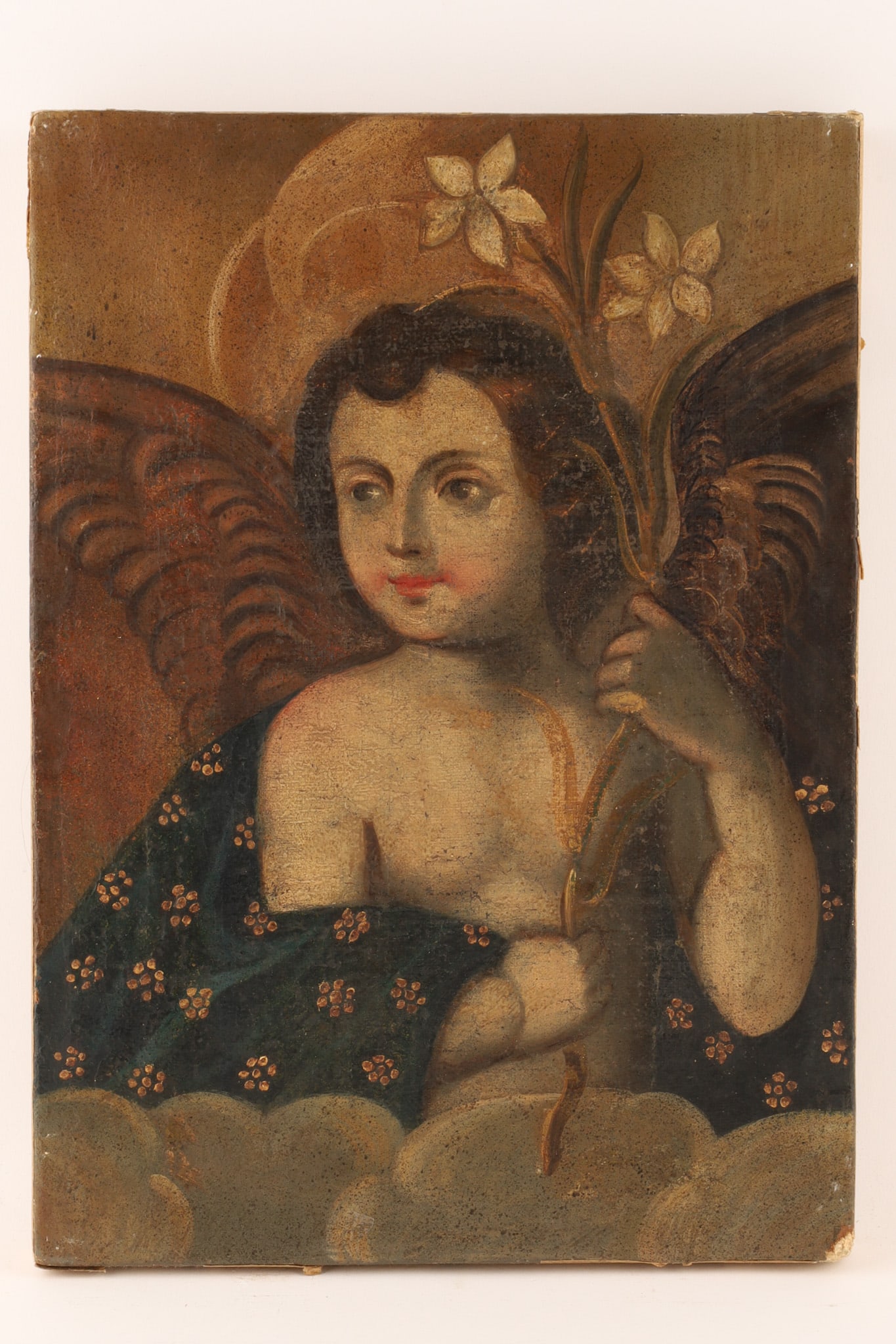 Spanish Colonial Cuzco School Oil on Canvas Angel with White Lilies: Spanish Colonial oil painting on canvas, from the Cuzco School in Peru, depicting an angel holding white lilies emerging from clouds. Measuring 13.5 inches H x 9.5 W.