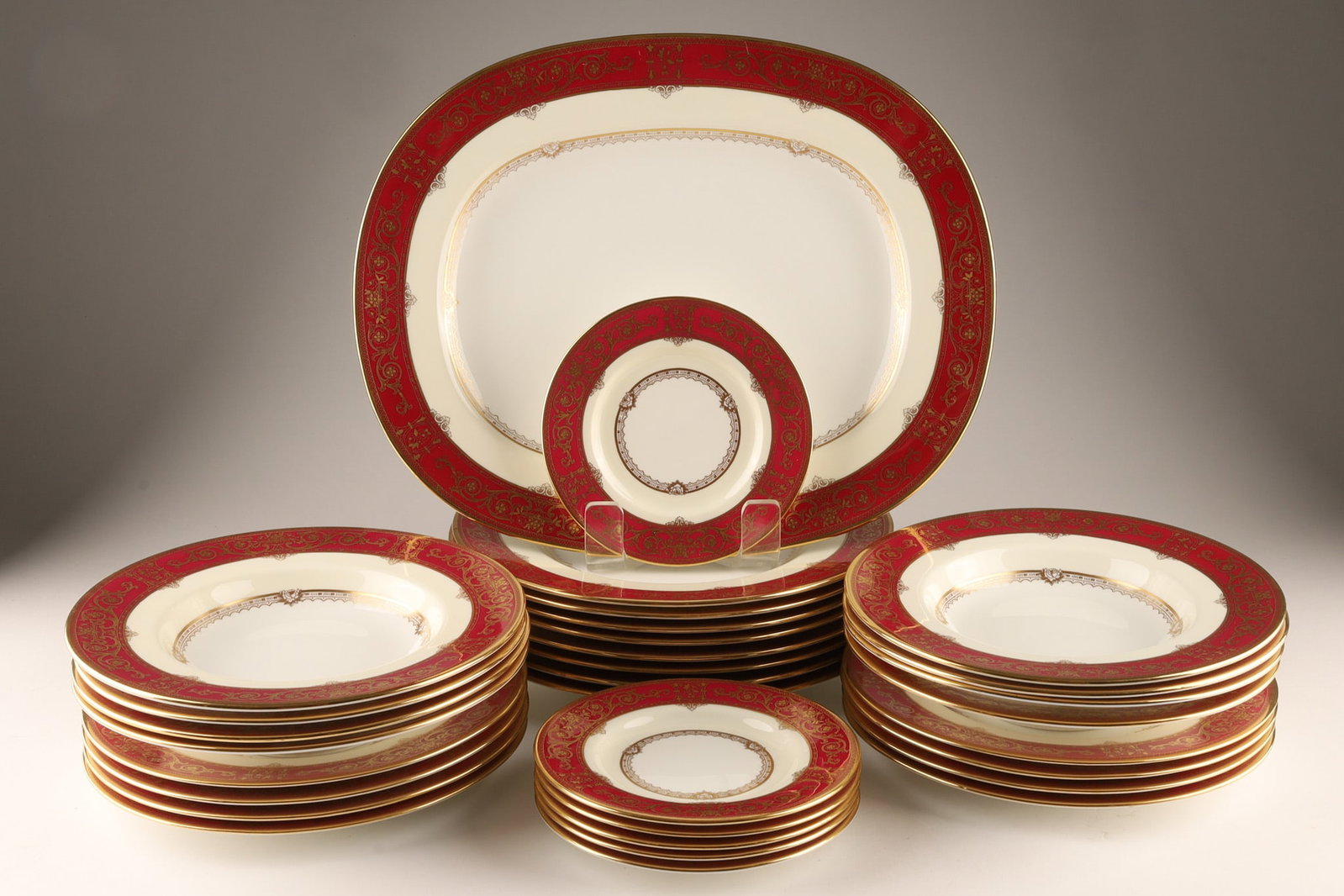Antique Minton for Birks Grasmere Crimson Fine Bone China Service: An elegant and highly collectible vintage porcelain partial dinner service crafted by renowned English maker Minton exclusively for luxury Canadian retailer Henry Birks and Sons. Features the prestigi