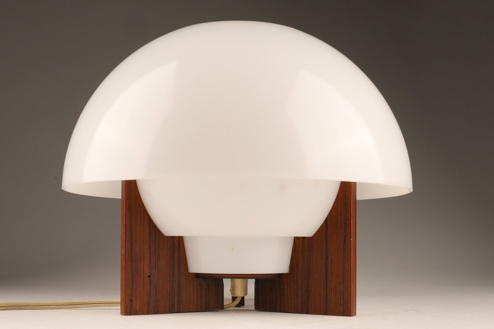 Mid Century Teak Spika-O Desk Lamp by Bent Karlby: Mid Century Teak Spika-O Desk Lamp by Bent Karlby featuring a plexiglass / acrylic dome shade resting neatly on a geometric wooden base. It was produced around 1970-1971 by ASK Belysning (A. Schroder 