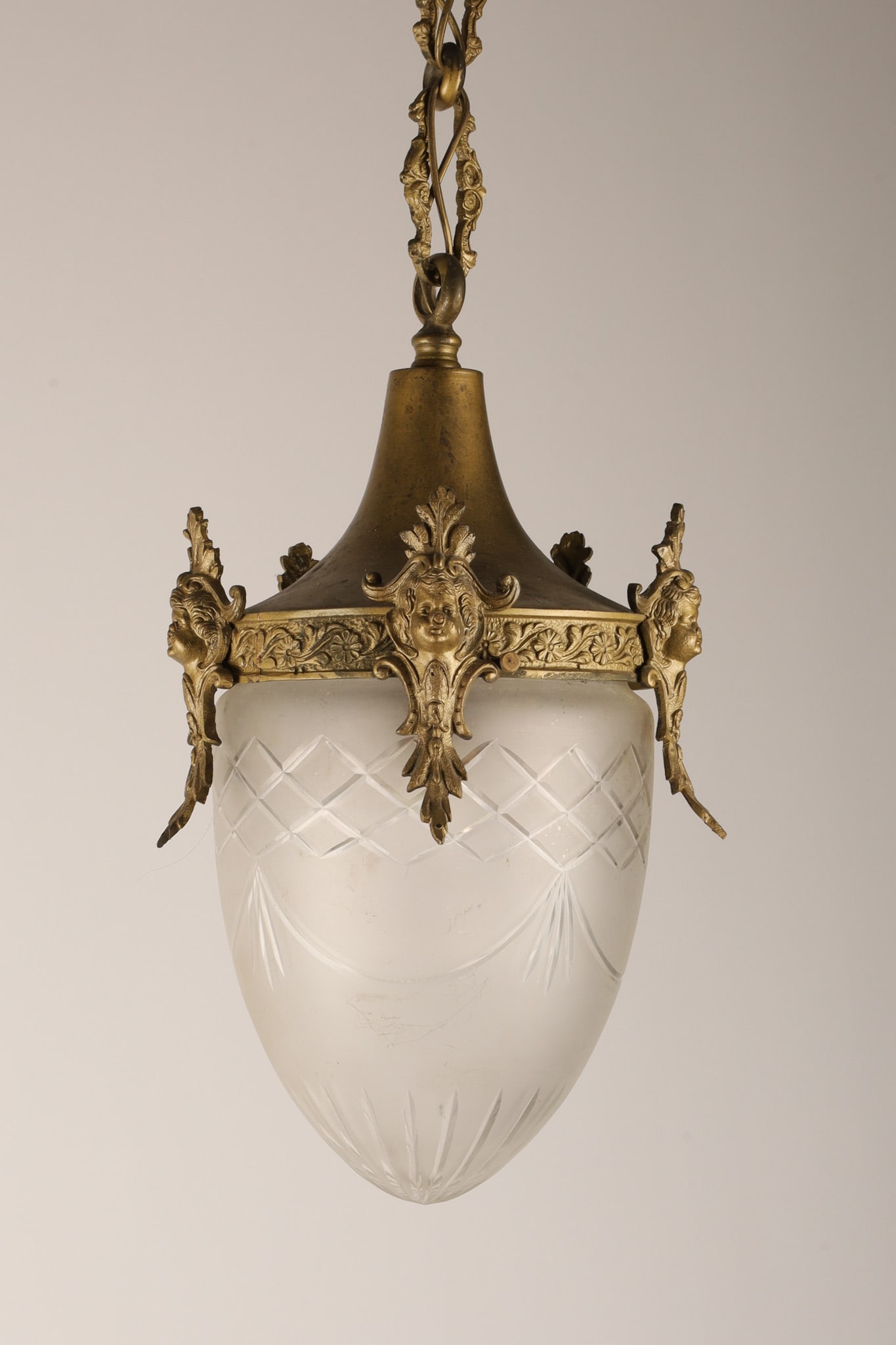 Antique French Art Nouveau Teardrop Hall Lamp Brass and Etched Glass C. 1890s: An antique French gilded brass and frosted etched glass teardrop-shaped hall lantern, in the Art Nouveau or Rococo tradition. Measuring 24 inches to the ceiling cup x 7 W, glass globe measures 7 inche