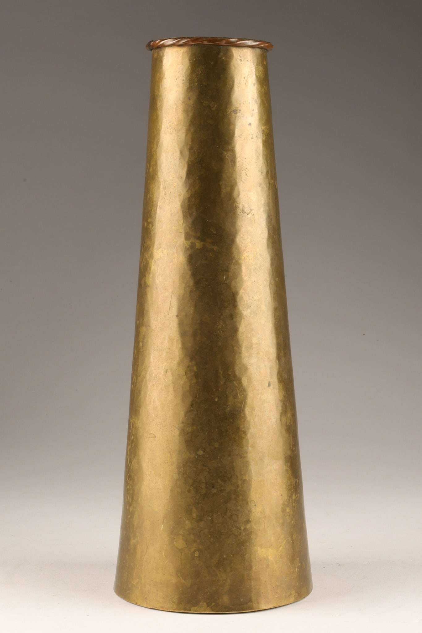 Paul Beau Arts Crafts Hand Hammered Copper Vase: Paul Beau (Canada, 1871-1949) unique Canadian Arts and Crafts hand crafted and hammered tapering cylindrical form vase with copper rope styled upper rim, stamped Paul Beau and Co. Montreal on base. 11