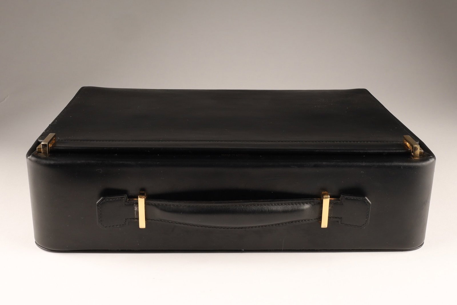 Hermes Paris Leather and Chinese Lacquer Travel Vanity Set: A Hermes Paris leather travel vanity case fitted with a Chinese red lacquer grooming ensemble comprising two square toiletry bottles numbered 1 and 2, together with a matching clothes brush, all with 