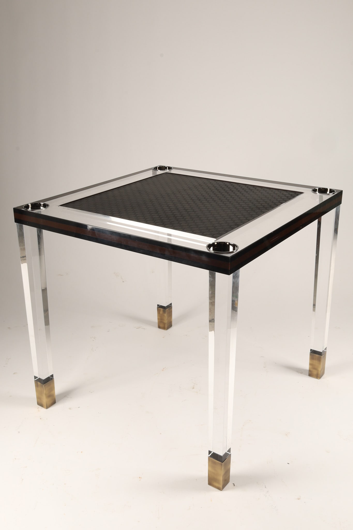 Very Rare Gucci Lucite and Leather Multi-game Table: This incredibly rare, high-end collector's item features thick clear acrylic legs and frame accented with brass feet and corner hardware. The tabletop design includes a removable, double-sided insert 