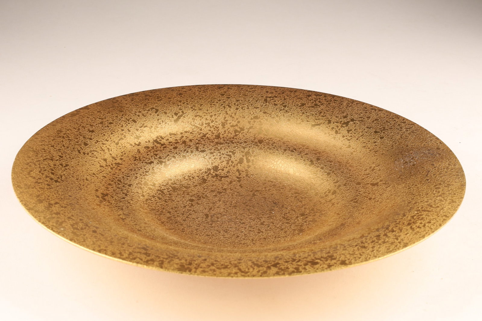 Tiffany Studios New York Gilded Bronze Plate / Low Bowl, Model 1708: Tiffany Studios New York Bronze Dore Shallow Bowl, crafted from bronze with a textured dore (gilt/gold) finish. Markings on the underside, Tiffany Studios New York, 1708. Measuring 9 inches W.