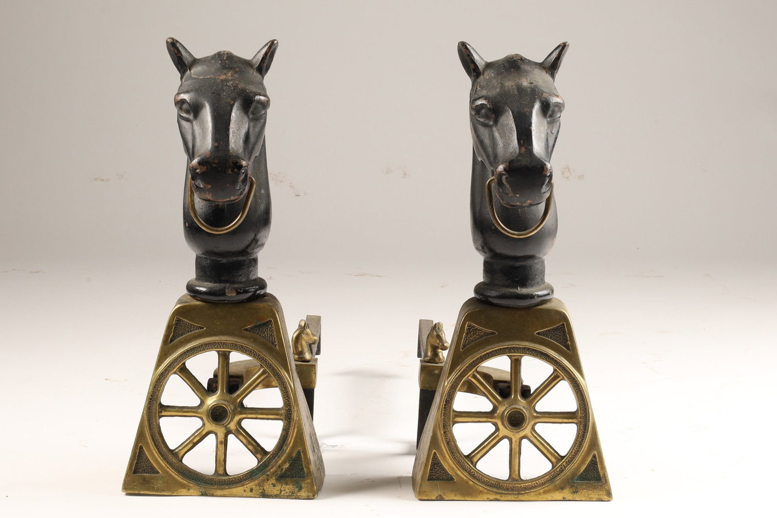 Pair of American Brass and Cast Iron Horse Head Wagon Wheel Andirons (1 of 5)
