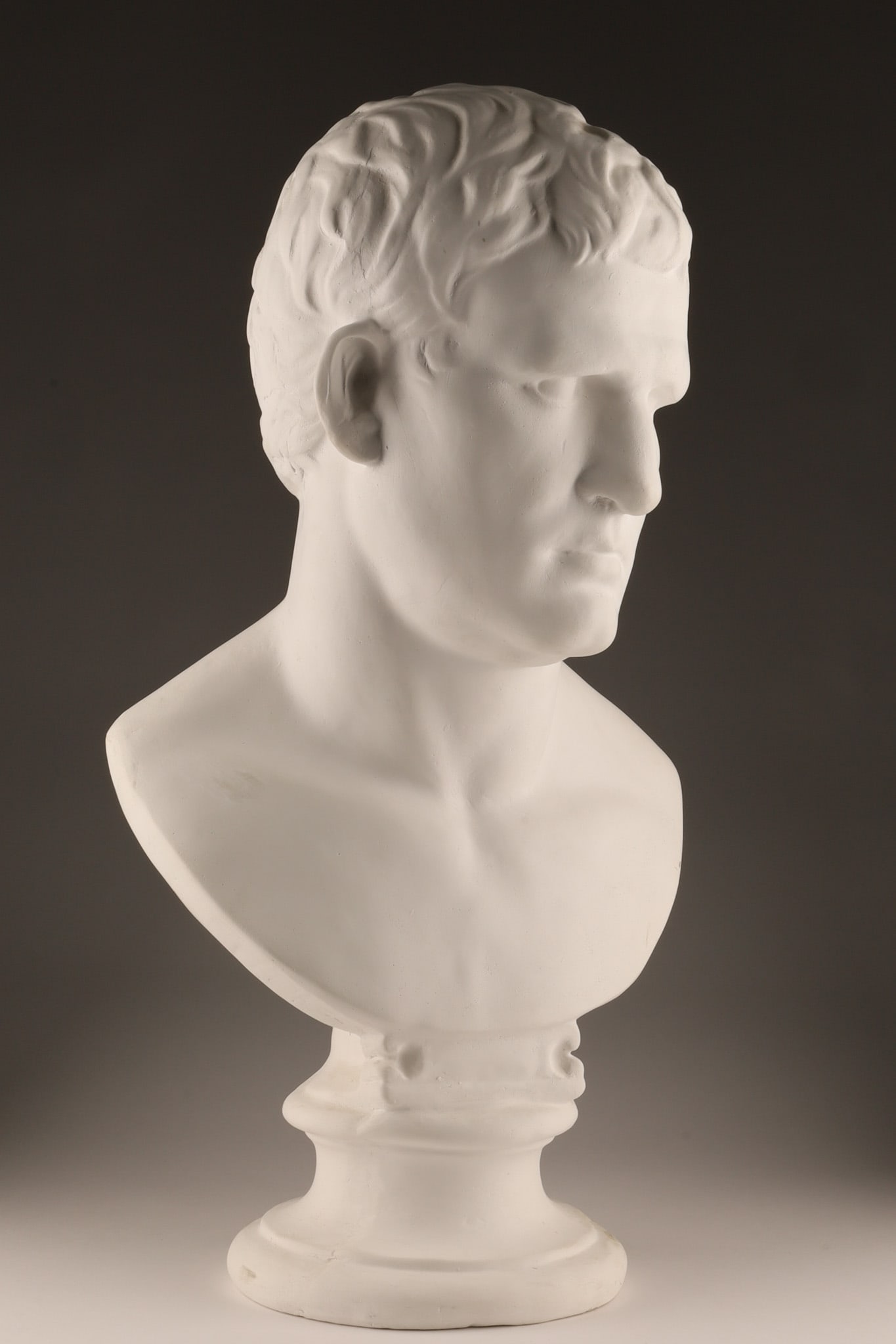 Large Molded Plaster Bust of Roman Genereal Agrippa: After the original bust in marble circa 25 BCE found in Italy, a molded plaster bust of the Roman General and Statesman Marcus Vipsanius Agrippa, circa 2nd half 20th century. 26 inches H x 14 W.