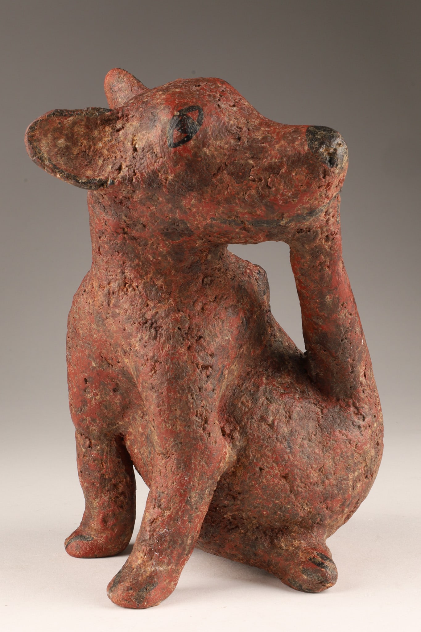Pre-Columbian Style Mexican Colima Dog Terracotta Pottery Sculpture: Pre-Columbian Style Colima dog pottery sculpture made of terracotta (or barro) and features a characteristic reddish-brown slip with black speckling depicting the Xoloitzcuintli, or Mexican hairless d