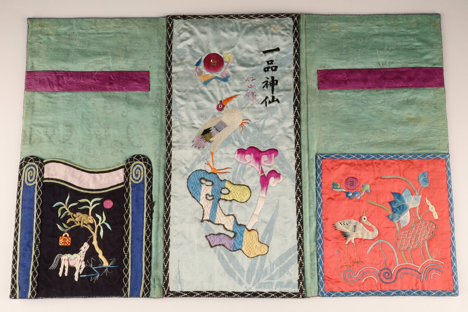 Chinese Antique Large Satin Embroidered Red Document Case with Script: THE SIMON CHANG COLLECTION - A Chinese antique large satin three part document case, the outside in deep crimson red satin with embroidered script in blue on all thee parts, the inside with a green sa