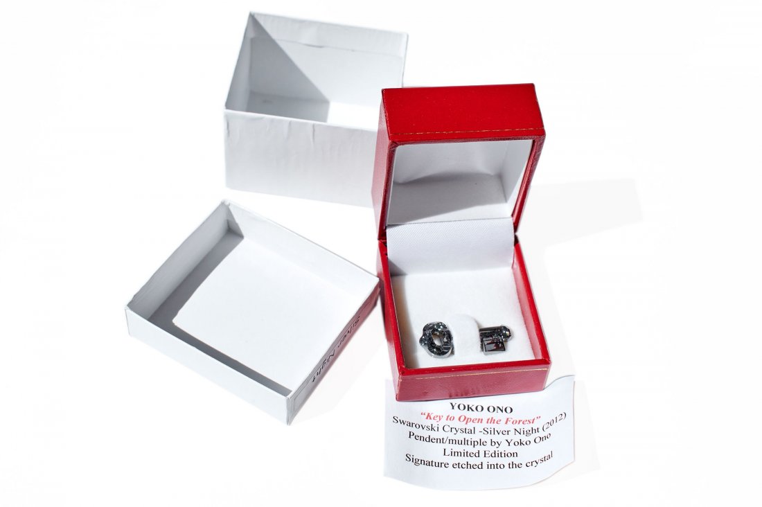 Yoko Ono (Japanese/American, Born 1933): "Key to Open the Forest." 2002. Crystal key in box. Signed on key. 1.5 x .25 x .0625 inches.