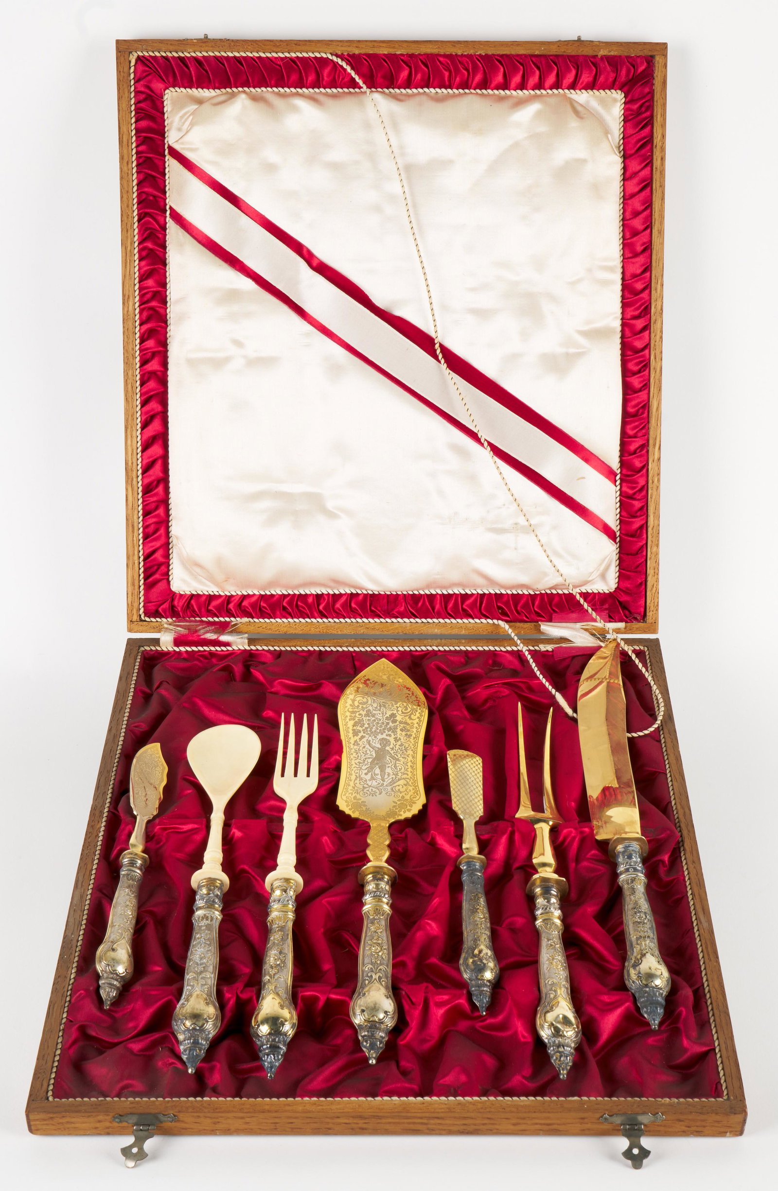 Stahl Neo Classical Serving Pieces: Gilt metal (handles possibly sterling) and carved bone serving pieces in an inlaid fitted and silk lined case. 15 x 14 in. (case); 13 x 1 in. (knife).