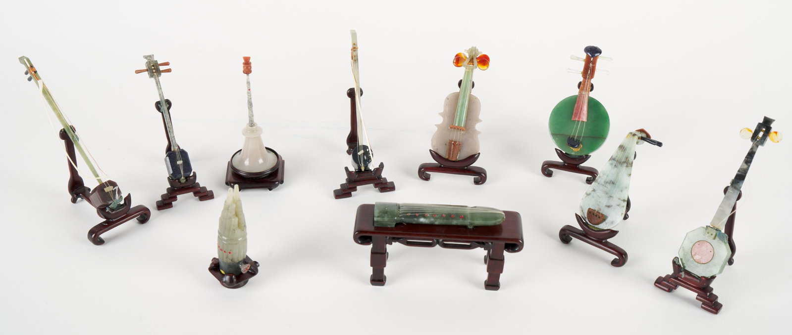 Carved Chinese Instruments & Wood Stands: Ten (10) carved instruments with wood stands. 3 1/2 L x 1 1/2 W (violin).