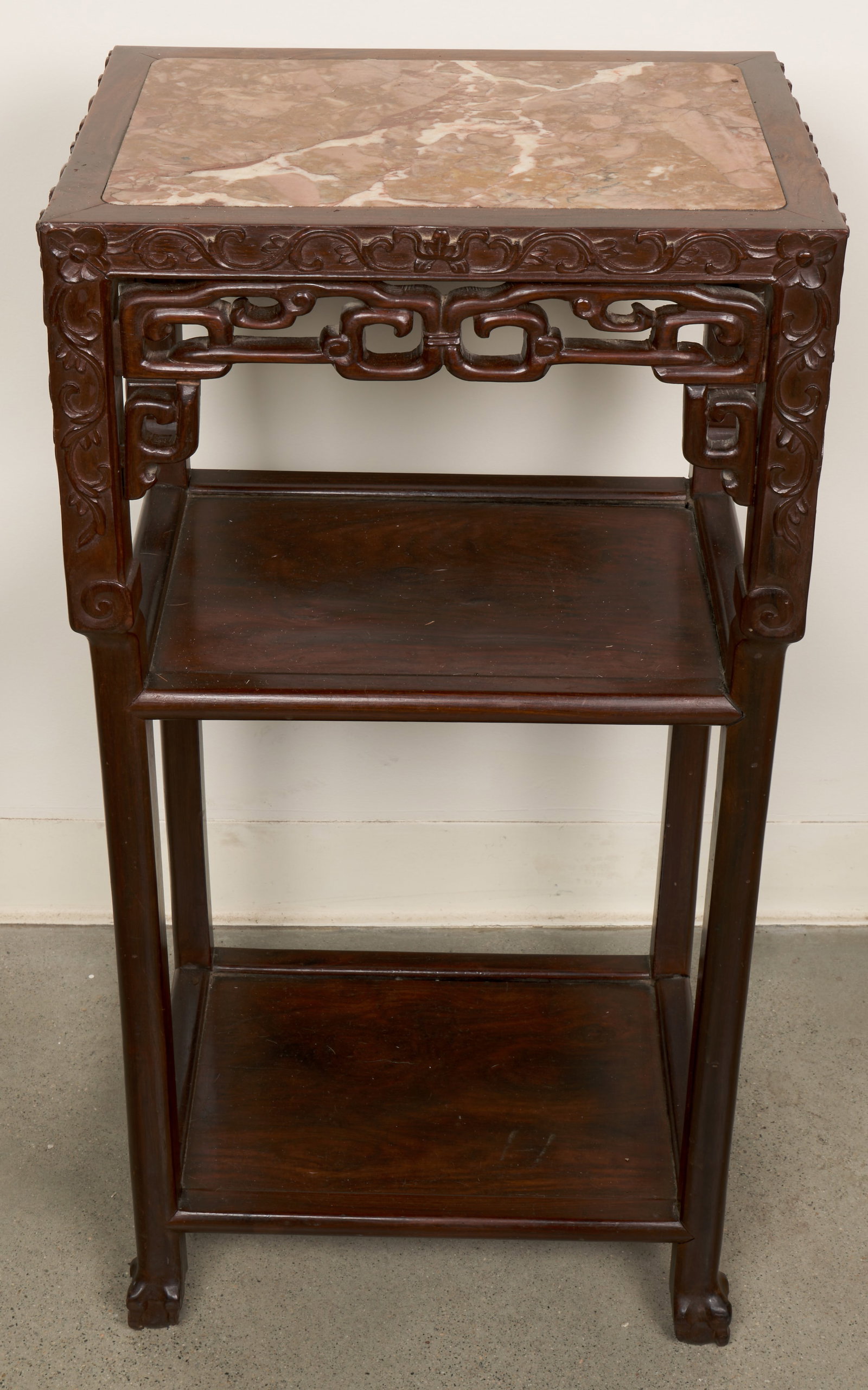Chinese Hardwood Carved Table: Carved hardwood table with stone top. 32 x 12 x 16 1/4".