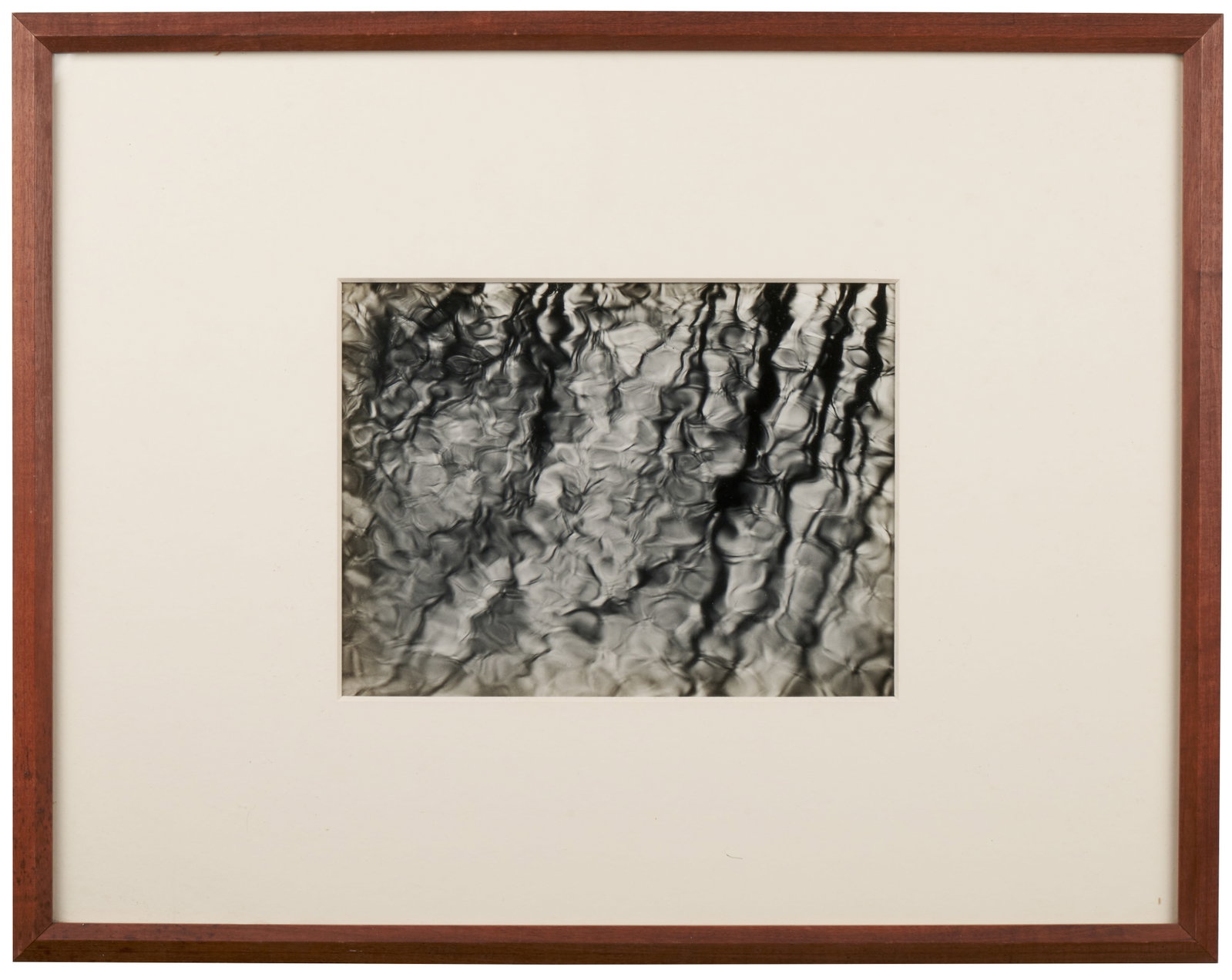 Paul Caponigro (American, b. 1932): Gelatin silver print. Circa 1970. This photograph appears to be from the "Water Series" and is signed in pencil on the verso. 8 x 10". Framed. Provenance: Acquired directly from the artist at a photog