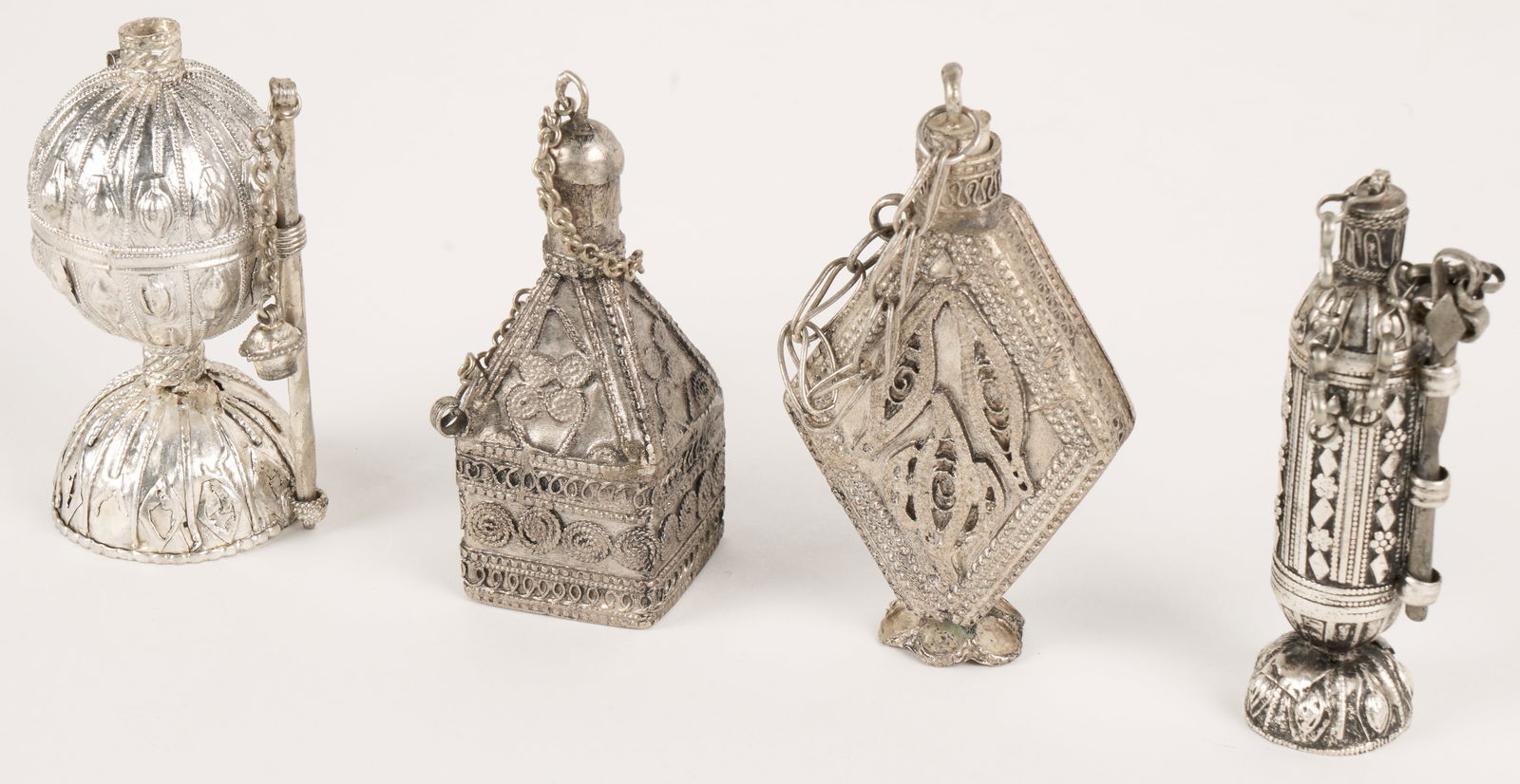 Bedouin Silver Kohl Flasks (Yemen, 20th Century): Four silver kohl flasks. 3 3/8 x 1 1/4" (largest). Provenance: Estate of Professor Lorraine Hawkins (Yemen Scholar).