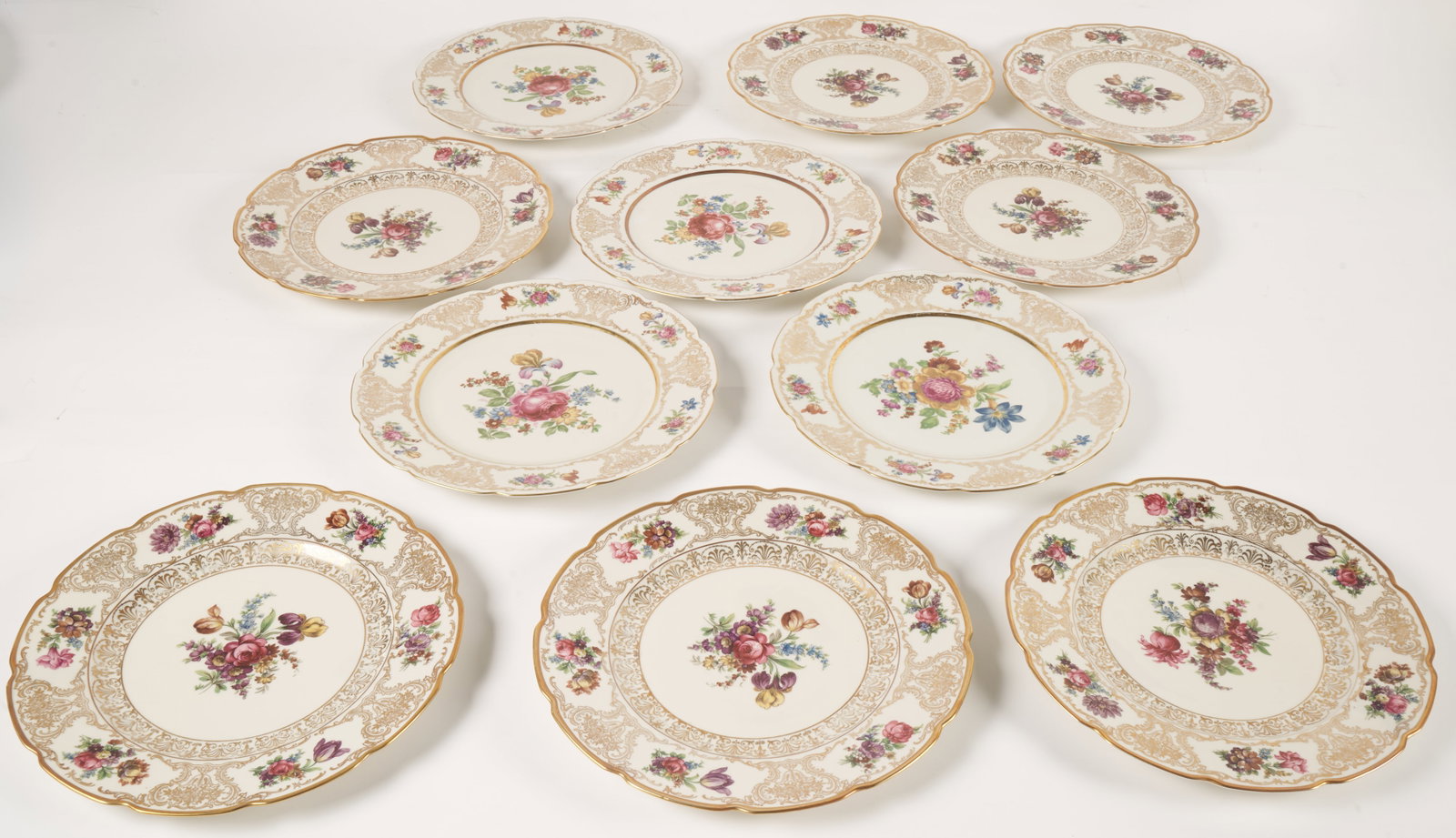 Dresden Porcelain Collection: Eleven plates. 11" diameter. Private Collection, Barrington, Rhode Island; from the families late 19th Century Maine Estate.