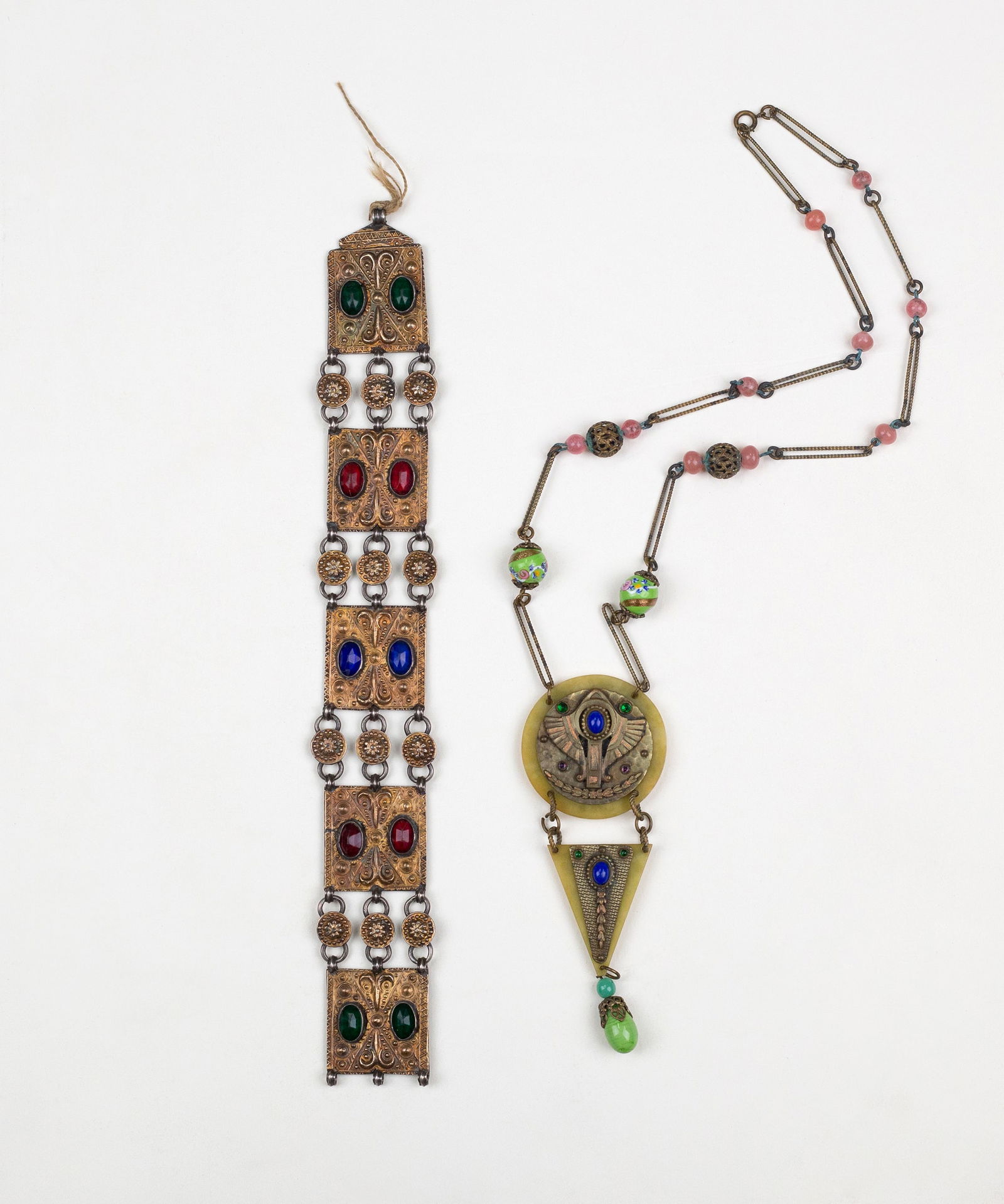 American Egyptian Revival Necklace and Bracelet: Egyptian Revival Bakelite necklace: 6 1/2 x 2" (sight); together with an antique costume bracelet: 11 x 1 1/2" (sight).