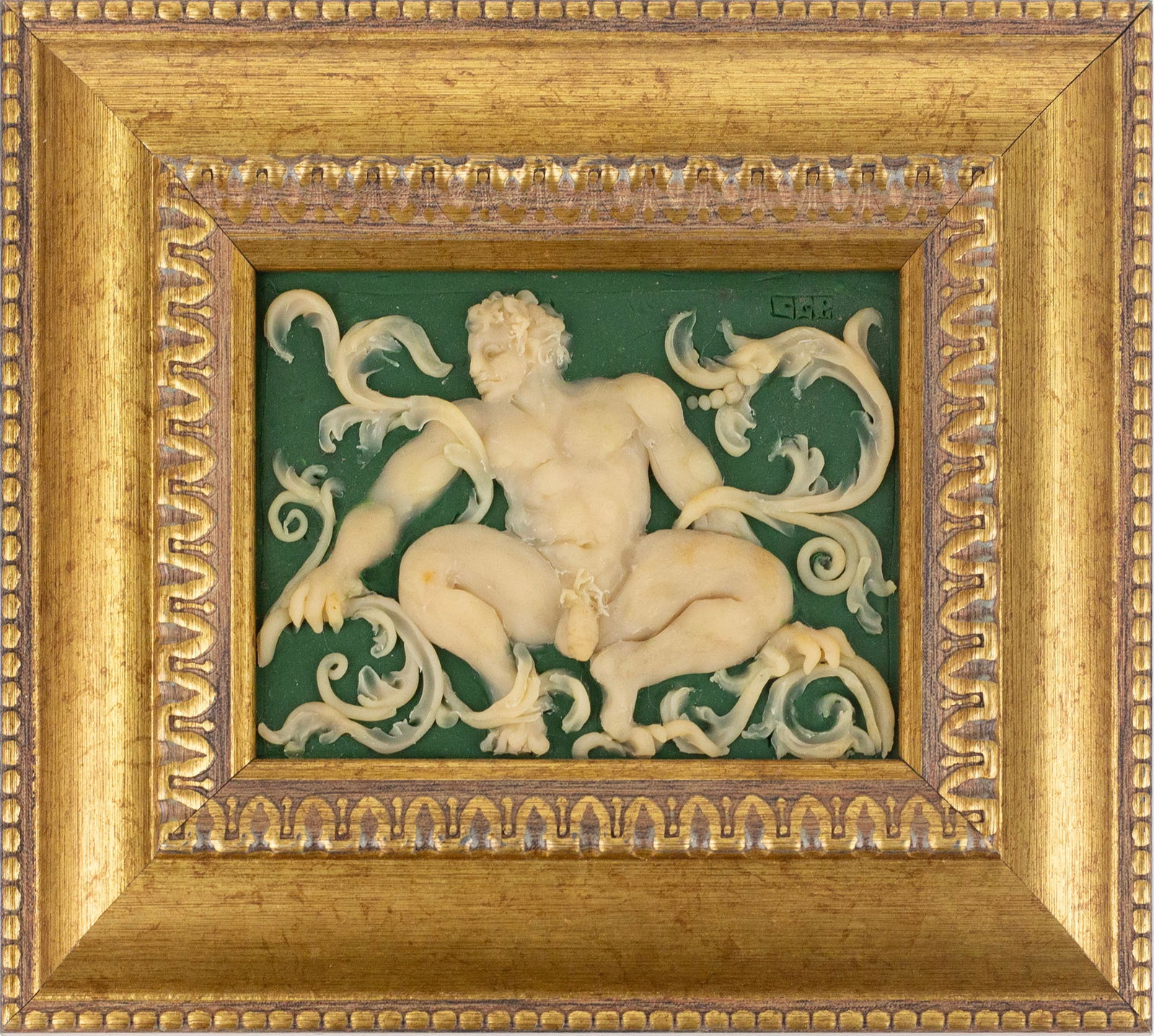 Campbell G. Paxton (American, b.1948): 'Bas Relief Man in Foliage'. Polymer clay. Monogramed at top right. 3 1/2 x 4 1/2";9 x 6".Framed.