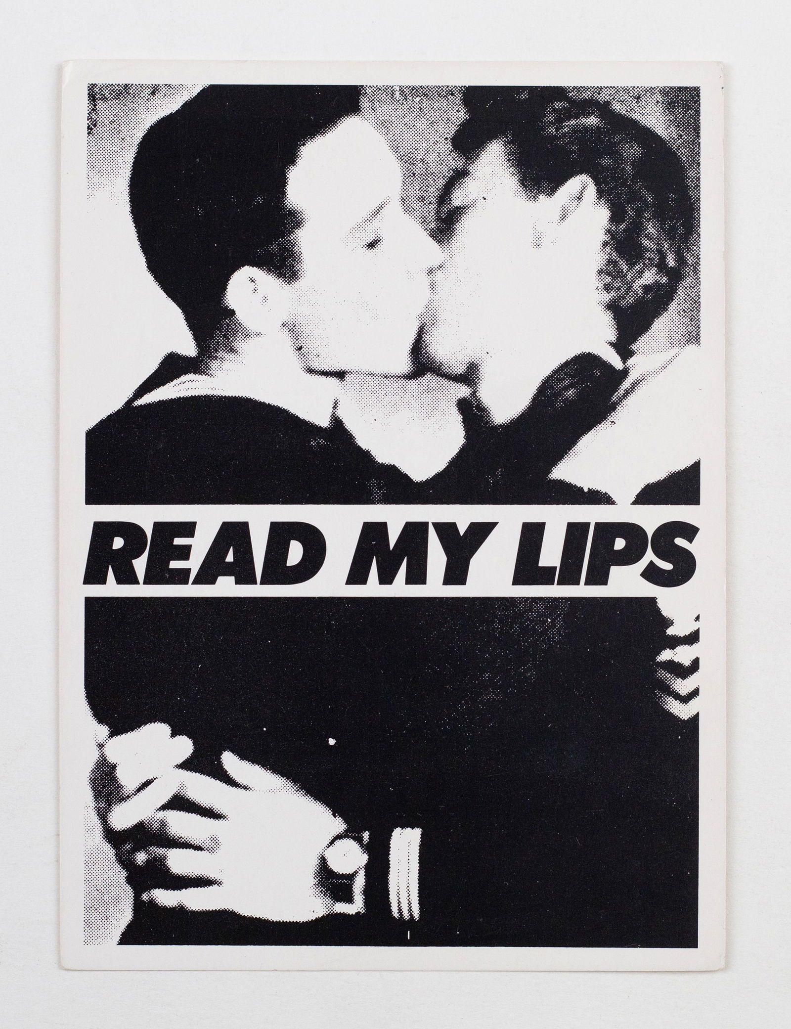 Gran Fury Postcard (1988): 'Read My Lips.' 1988. Original postcard printed to benefit ACT UP, the AIDS Coalition. 6 3/4 x 4 1/4". The image of the two sailors kissing taken from a 1950s pornographic magazine, akin to Physique P