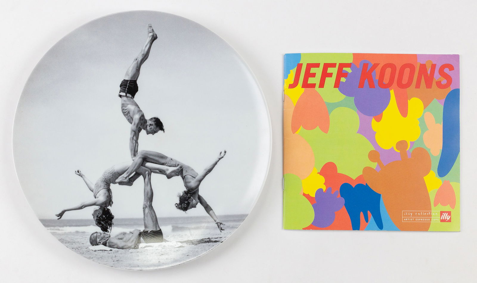 Jeff Koons (American, b. 1955) Kitchen Items: Two (2) sets of art kitchenware. One "WOW (Works on Whatever) Plate.". 2012. Porcelain. Produced by Bernardaud, France. Edition of 7,000. Diameter: 10 1/2"; Six (6) espresso cups and saucers, made in