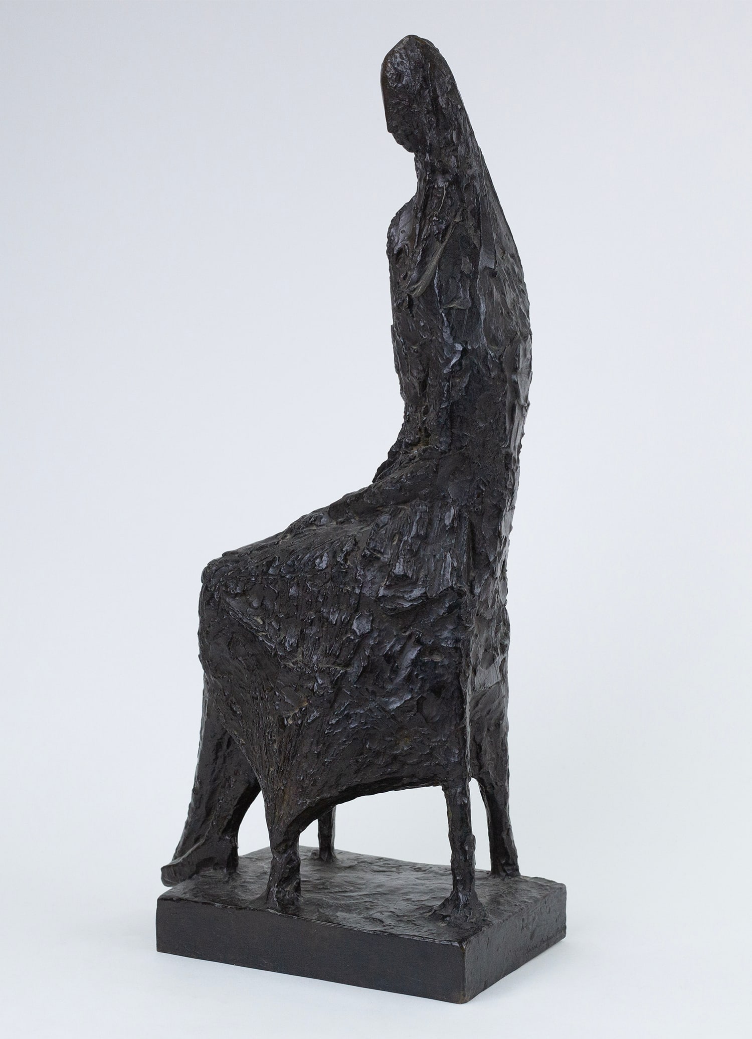 Chana Orloff (Ukrainian - French - Israeli, 1888 - 1968): "Seated Woman". 1960. Cast bronze. Signed and dated on base. 23 x 11 x 6" (sight). "In 1911 (Orloff) matriculated at the Ecole nationale superieure des arts decoratifs in hopes of pursuing a career in