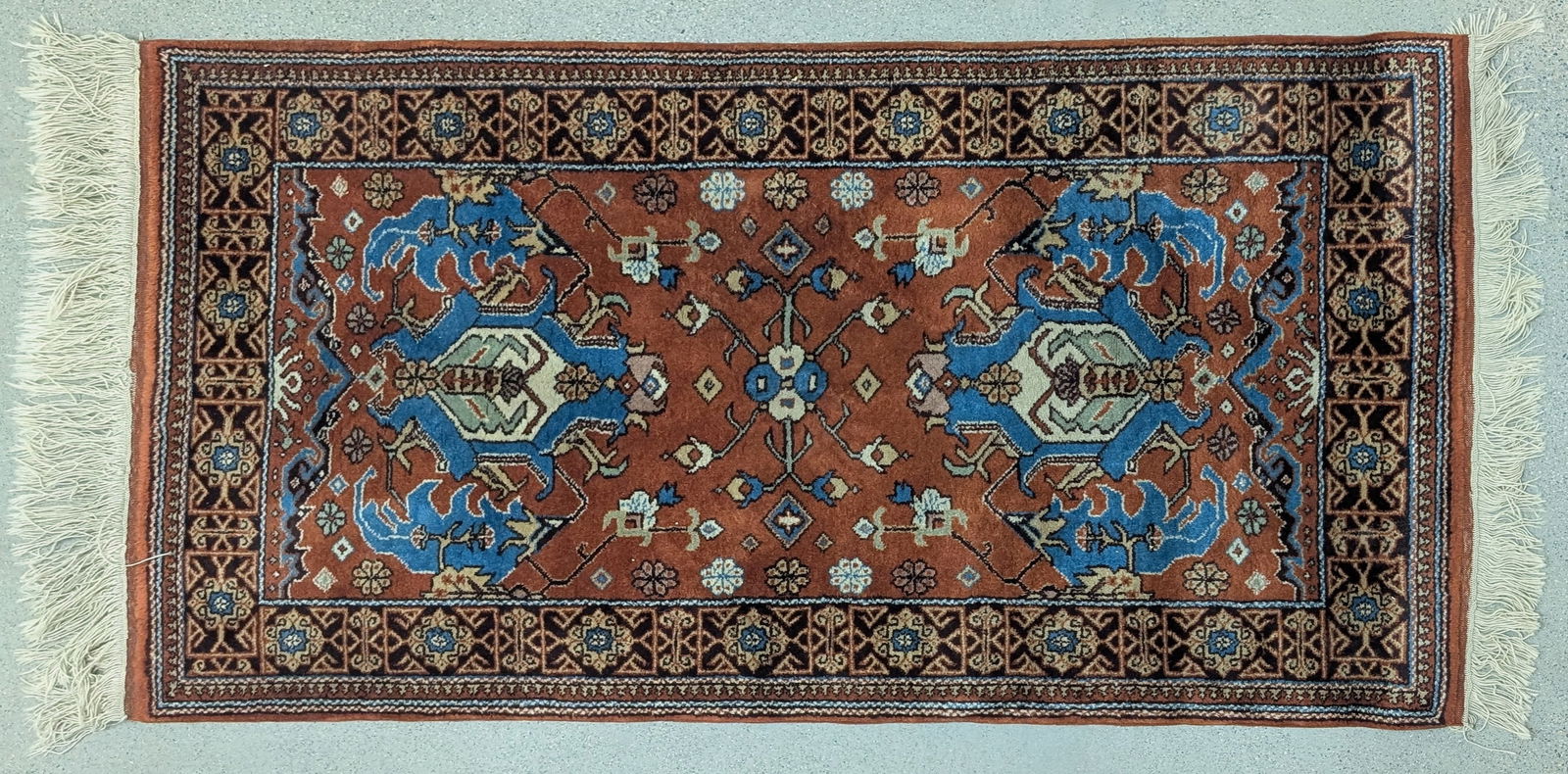 20th Century Persian Rug: A 20th-century Persian rug. 60" x 38". Provenance: property of a Rhode Island collection. Shipping: At checkout, you can choose integrated shipping with LiveAuctioneers LiveShipping, or you can choose